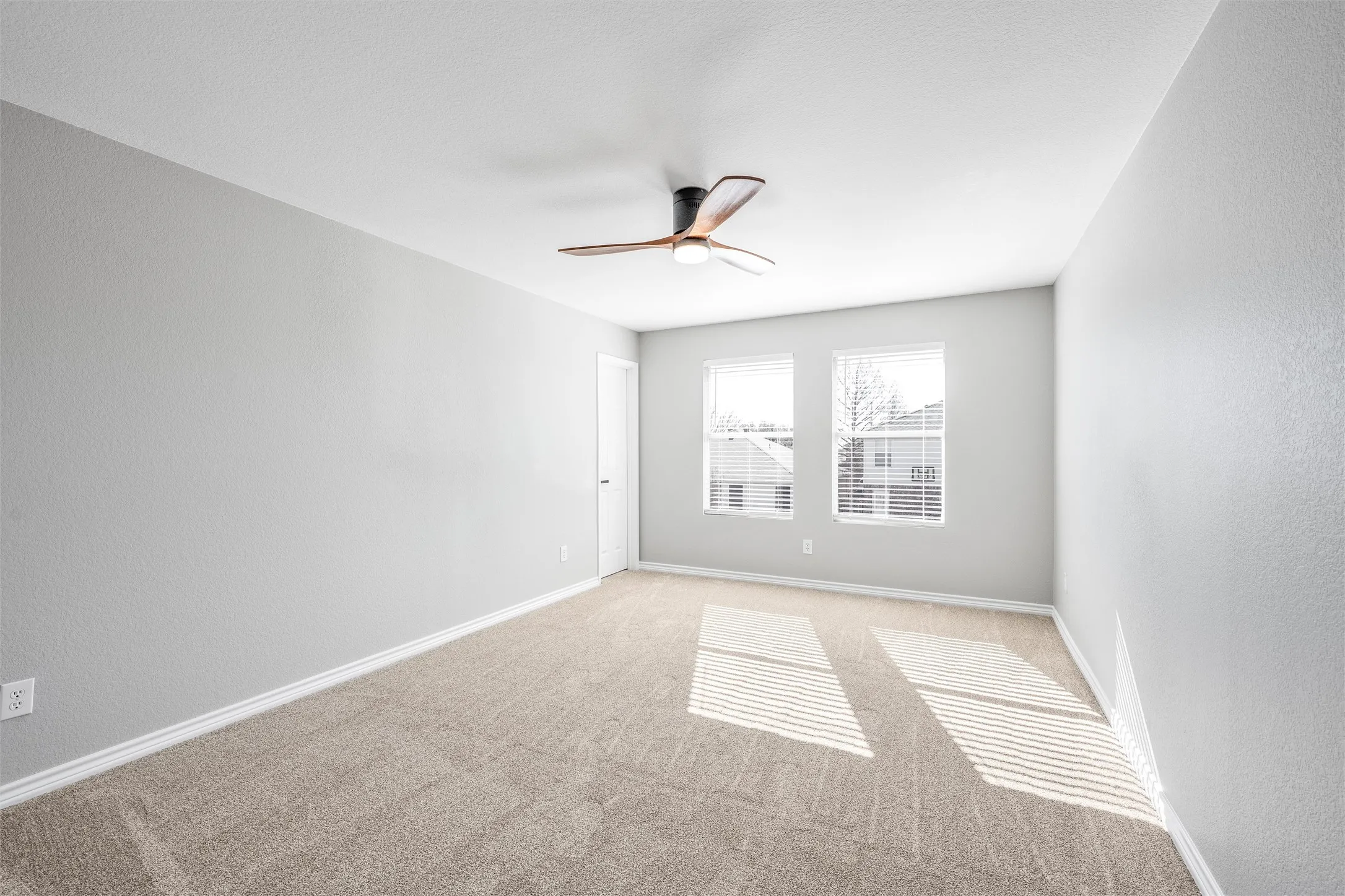 Upstairs Bedroom #4 with walk in closet, new carpet and ceiling fan