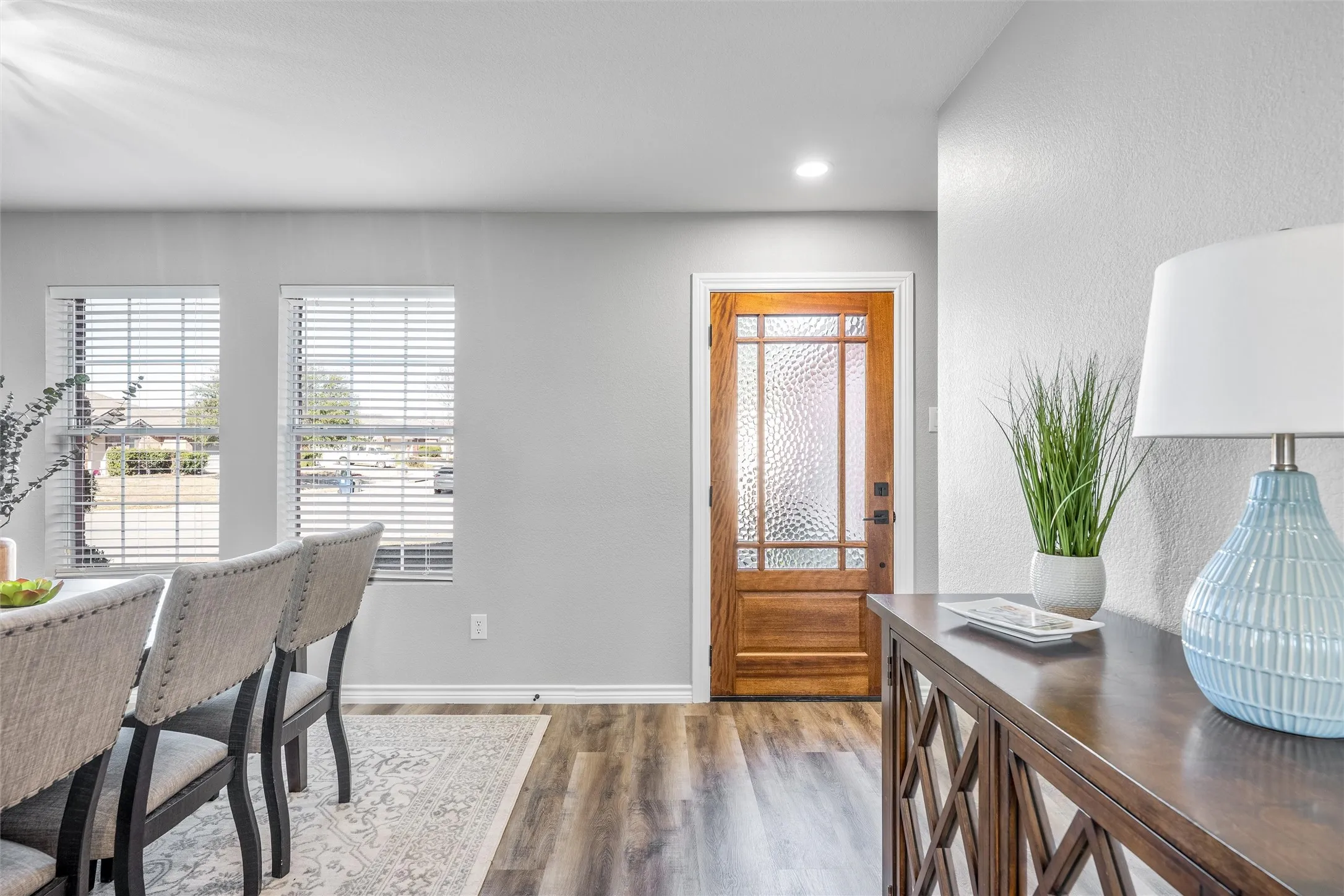 LVP wood floors, fresh paint inside and out, new blinds!