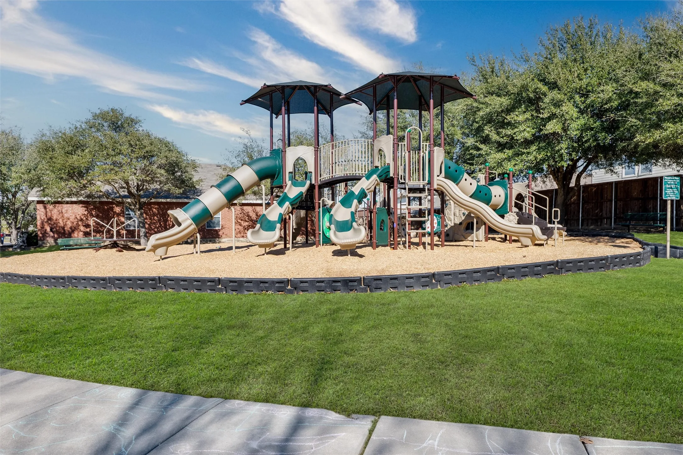 Community playground & walking trails and trees in the neighborhood