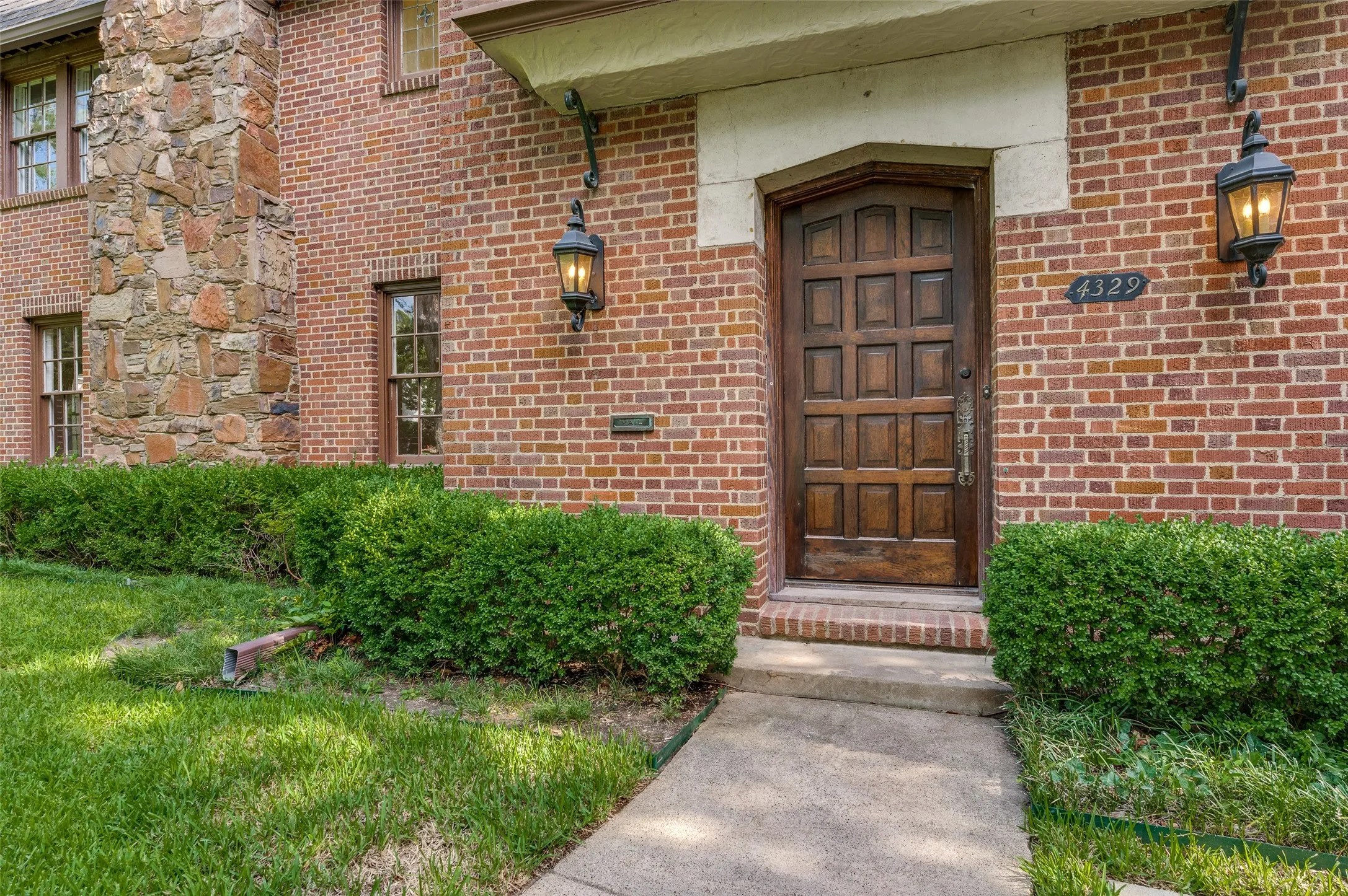 Charming entry to inviting Tudor style home.