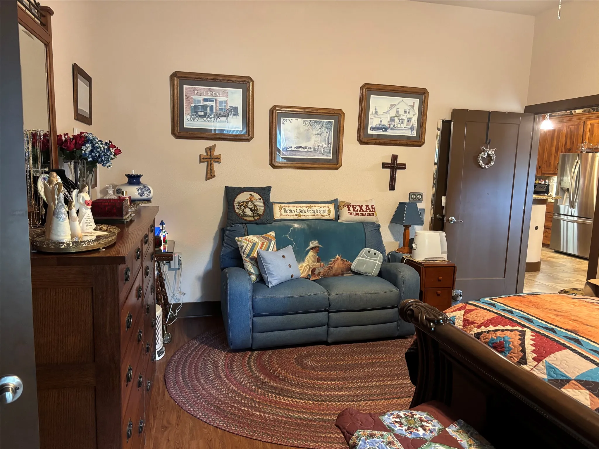 Warm interior space featuring wood-finish flooring and a vaulted ceiling