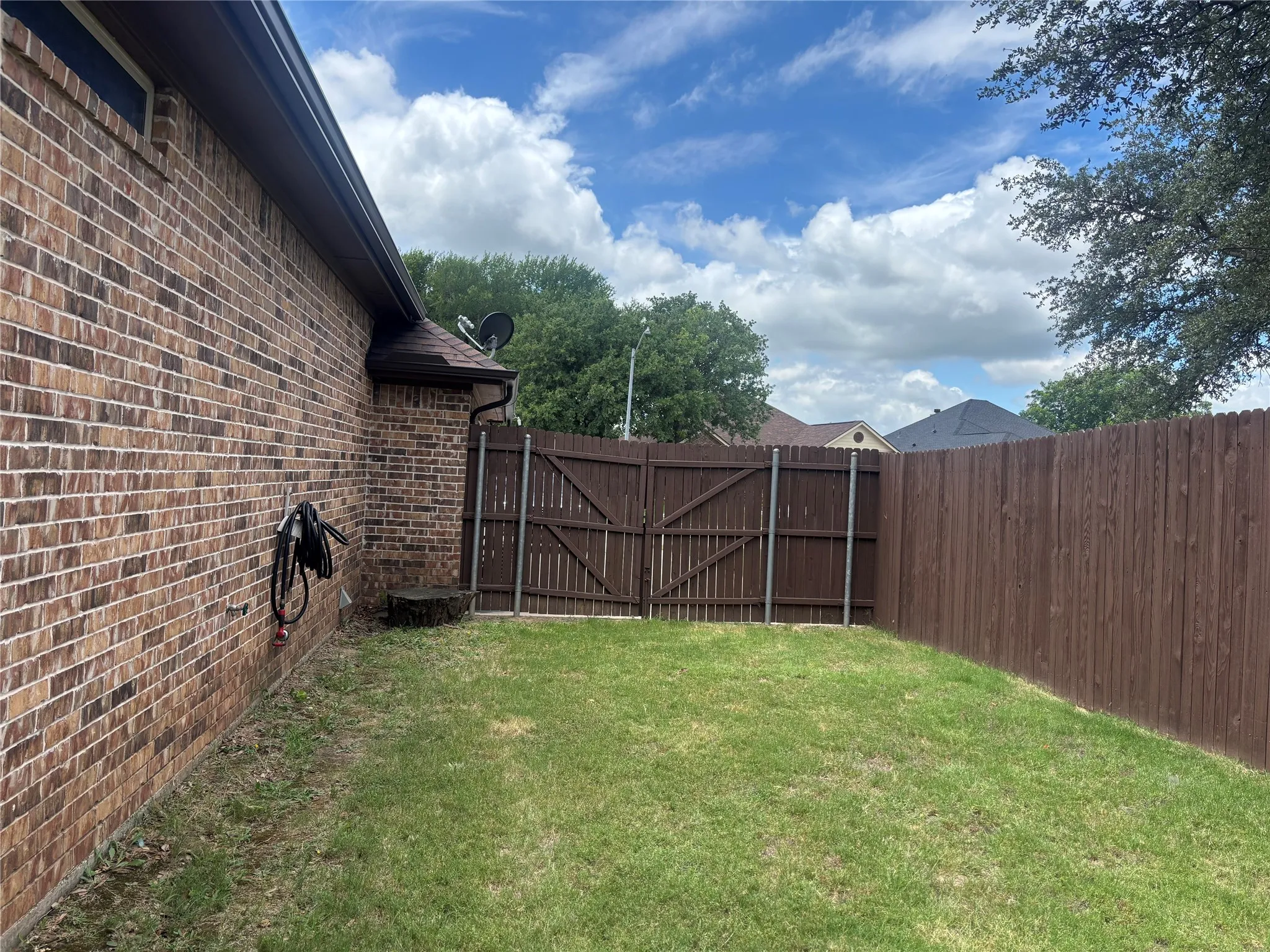 Double gate to extended drive way