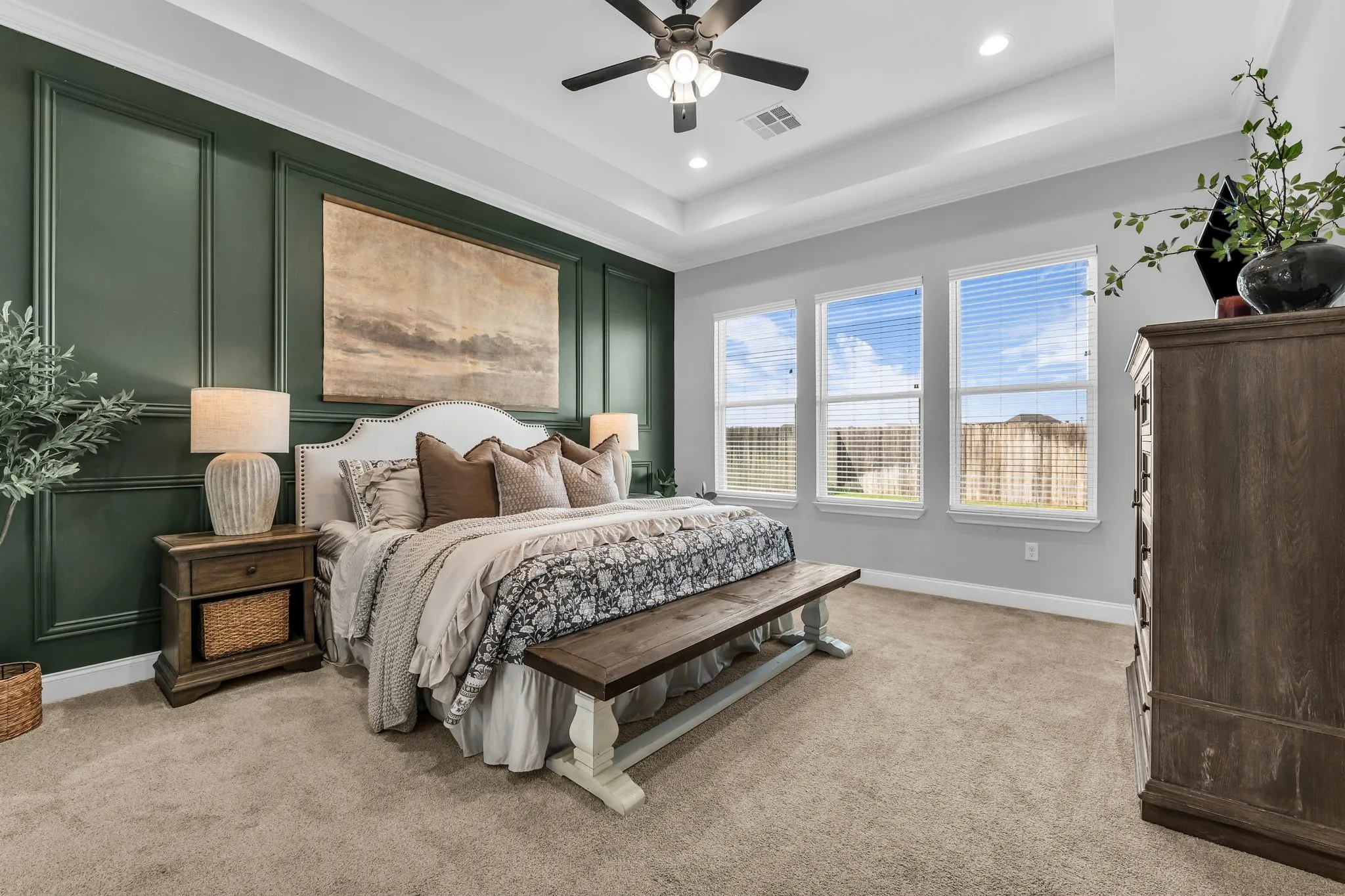 isolated primary bedroom with accent wall; wake up to a serene view