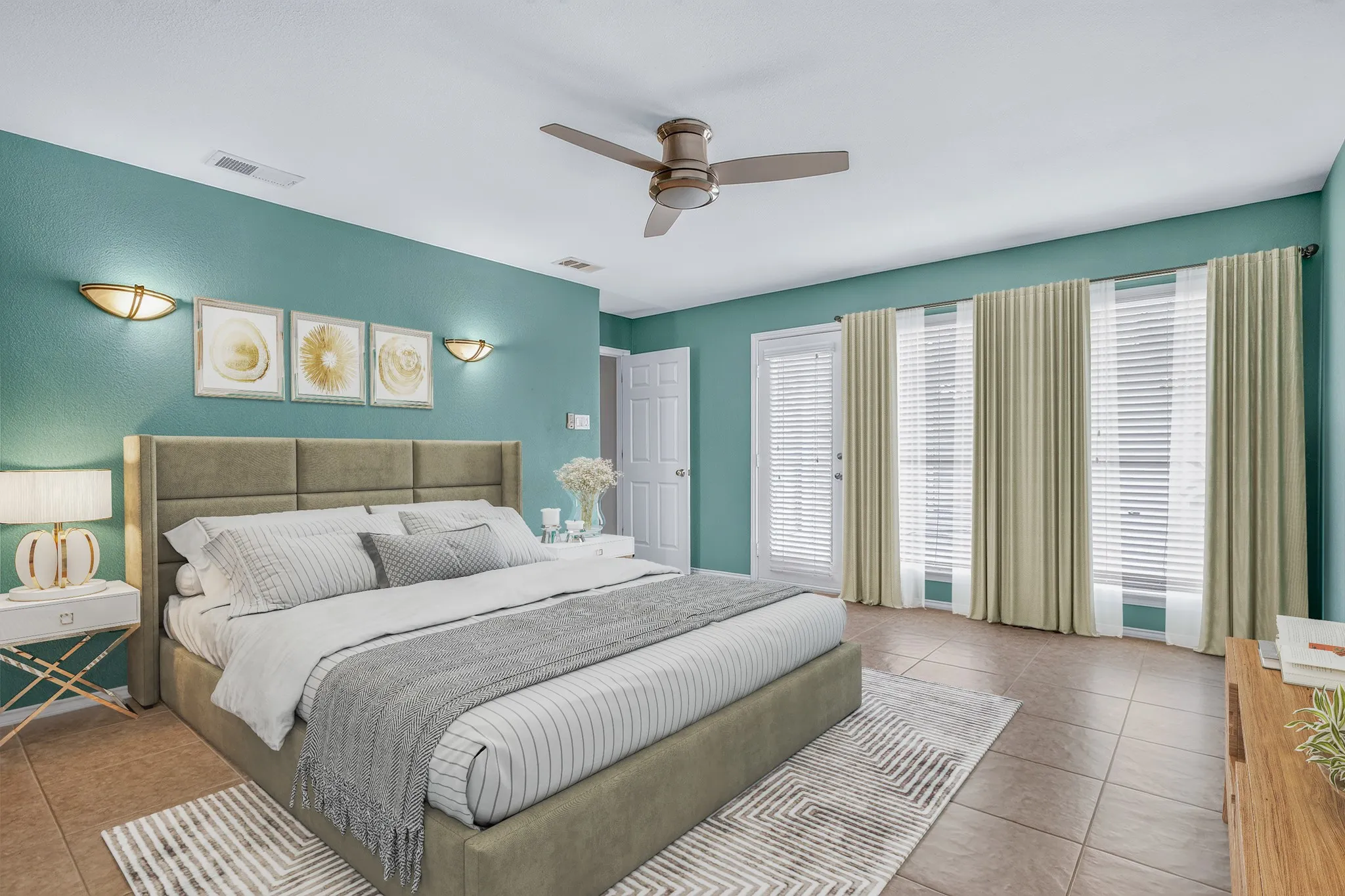 The spacious primary suite is a true retreat, featuring dual vanities, a seamless glass shower with bench seating, a jetted Hydrabath tub & an impressive 17x12 walk-in closet. The furniture and decor in this photo has been virtually staged, not altering the room.