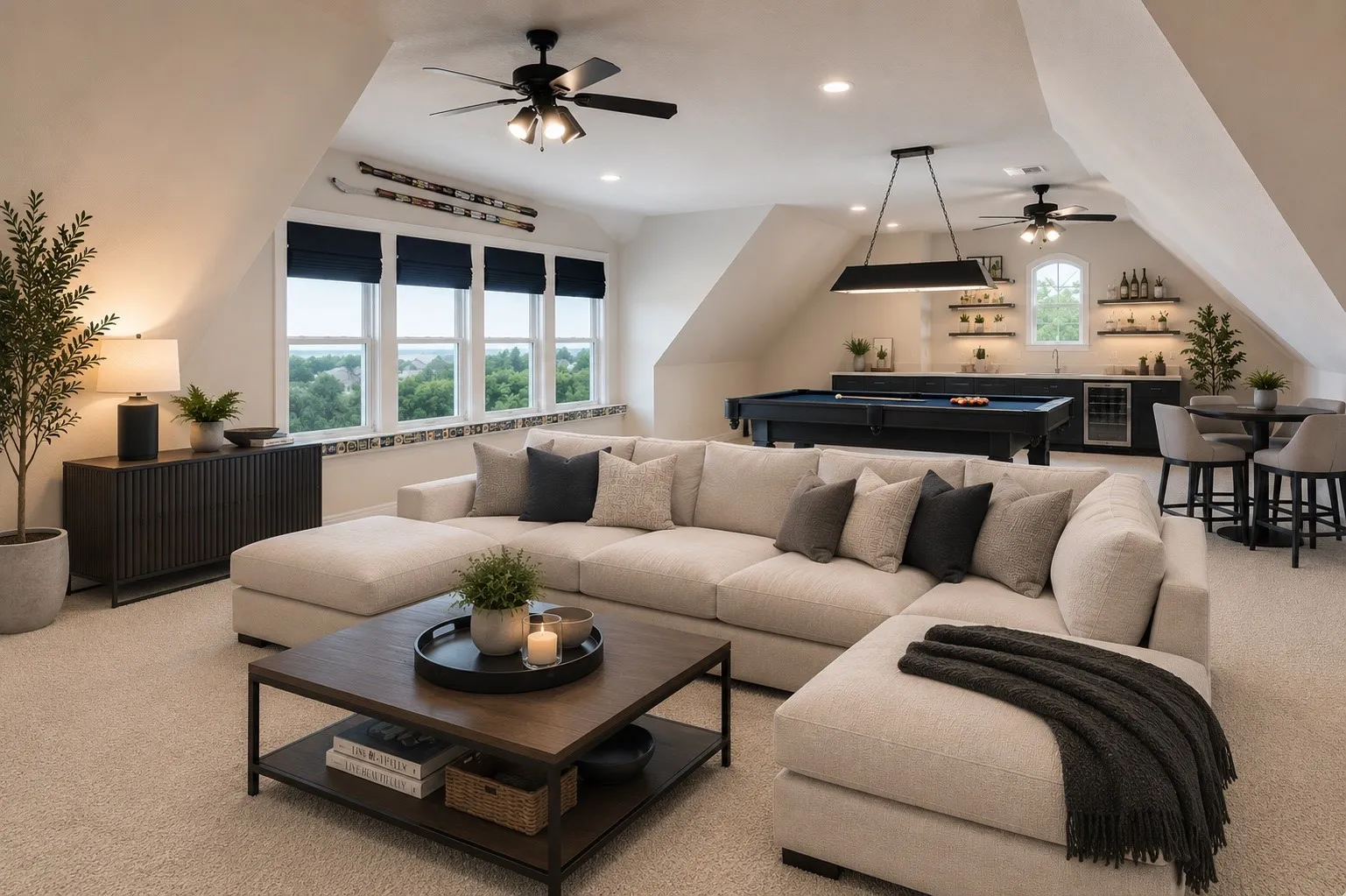 Spacious living area featuring sloped ceilings, multiple windows, a built-in wet bar with shelving, a full-size billiards table, and recessed lighting