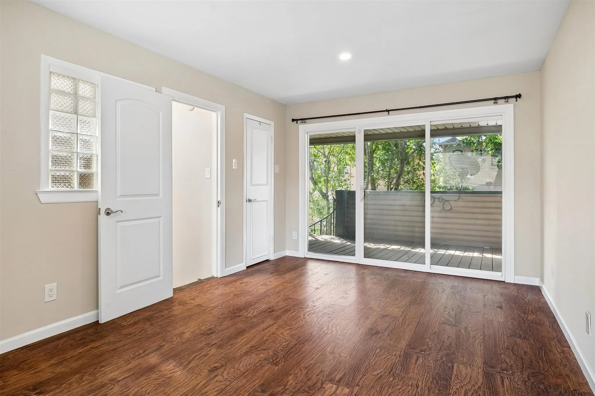 3rd story bedroom with private balcony and bathroom