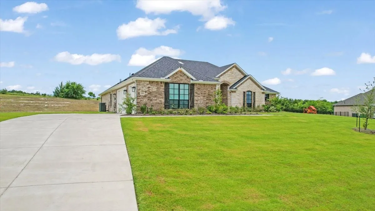 Spacious 3-Car Garage.