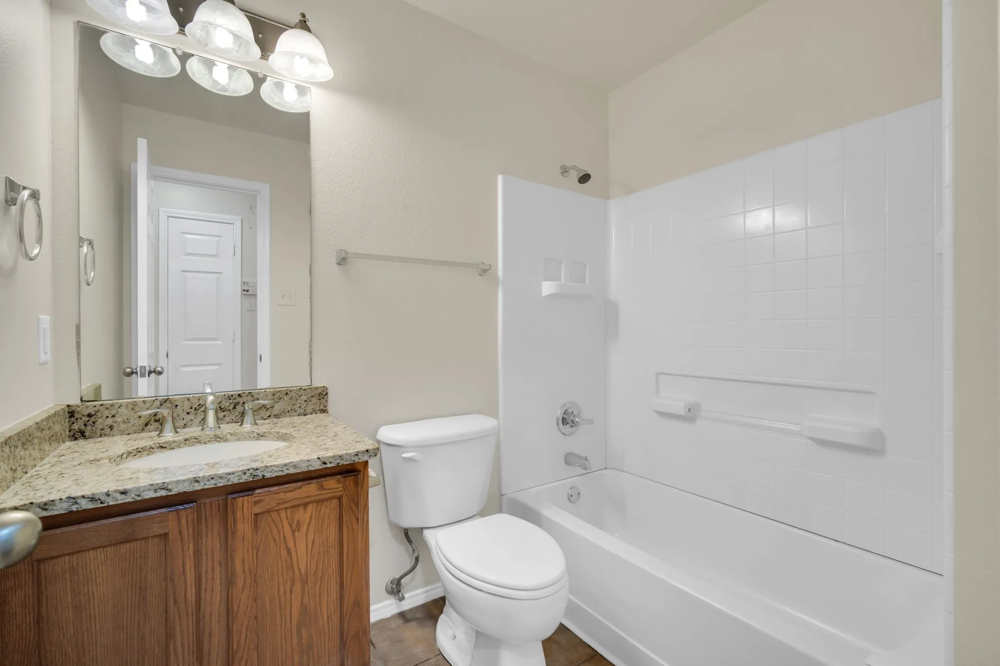 Guest bathroom featuring brand new upgraded countertops