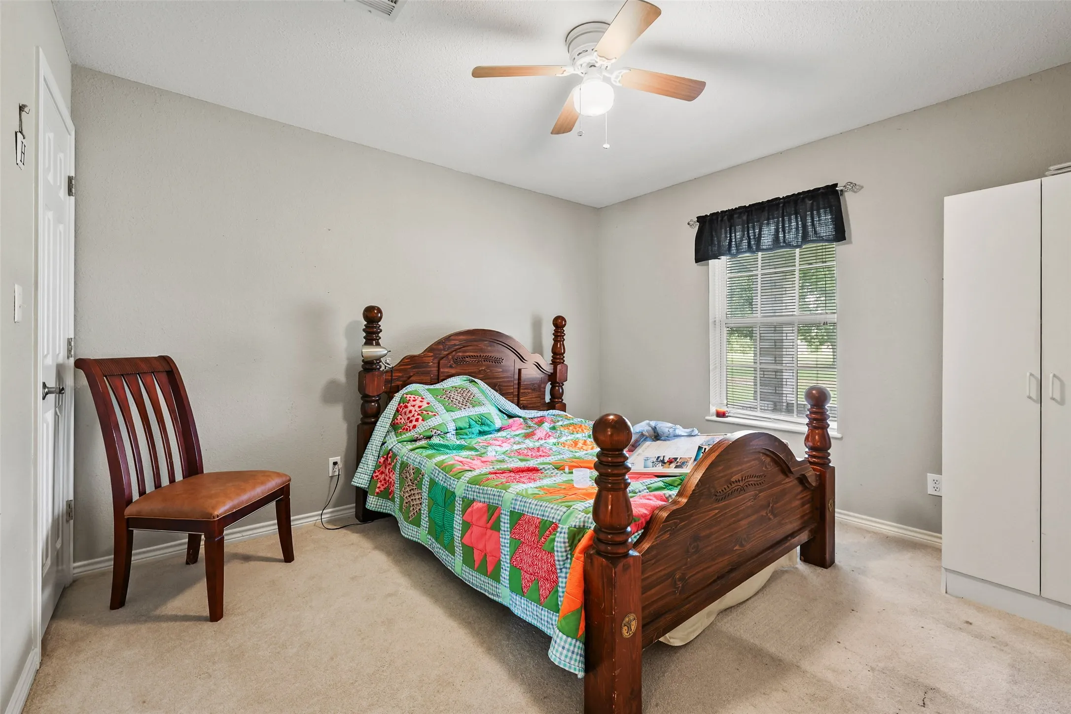Secondary bedroom at front of the house