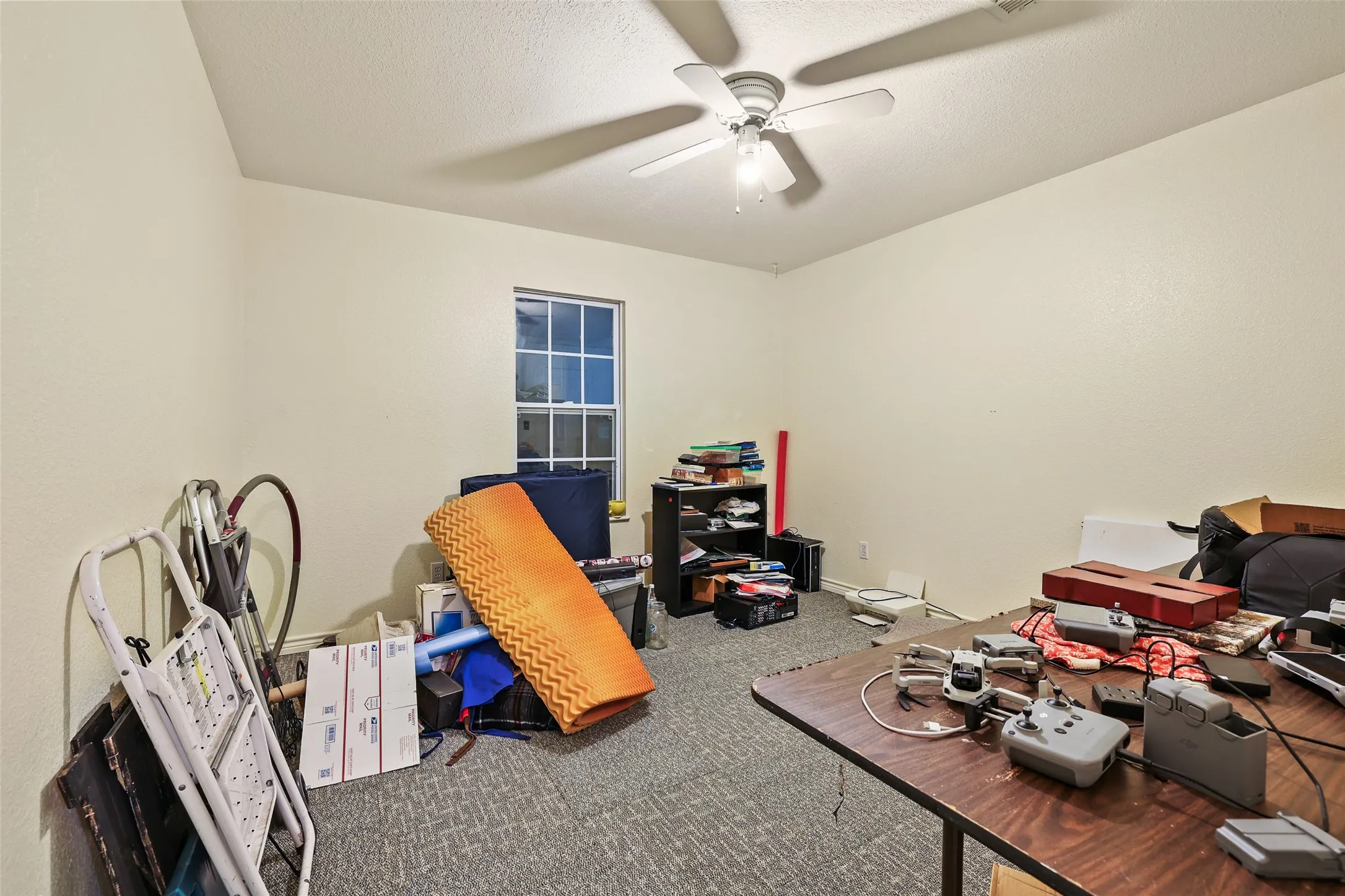 Secondary bedroom at rear of the house is perfect for a home office