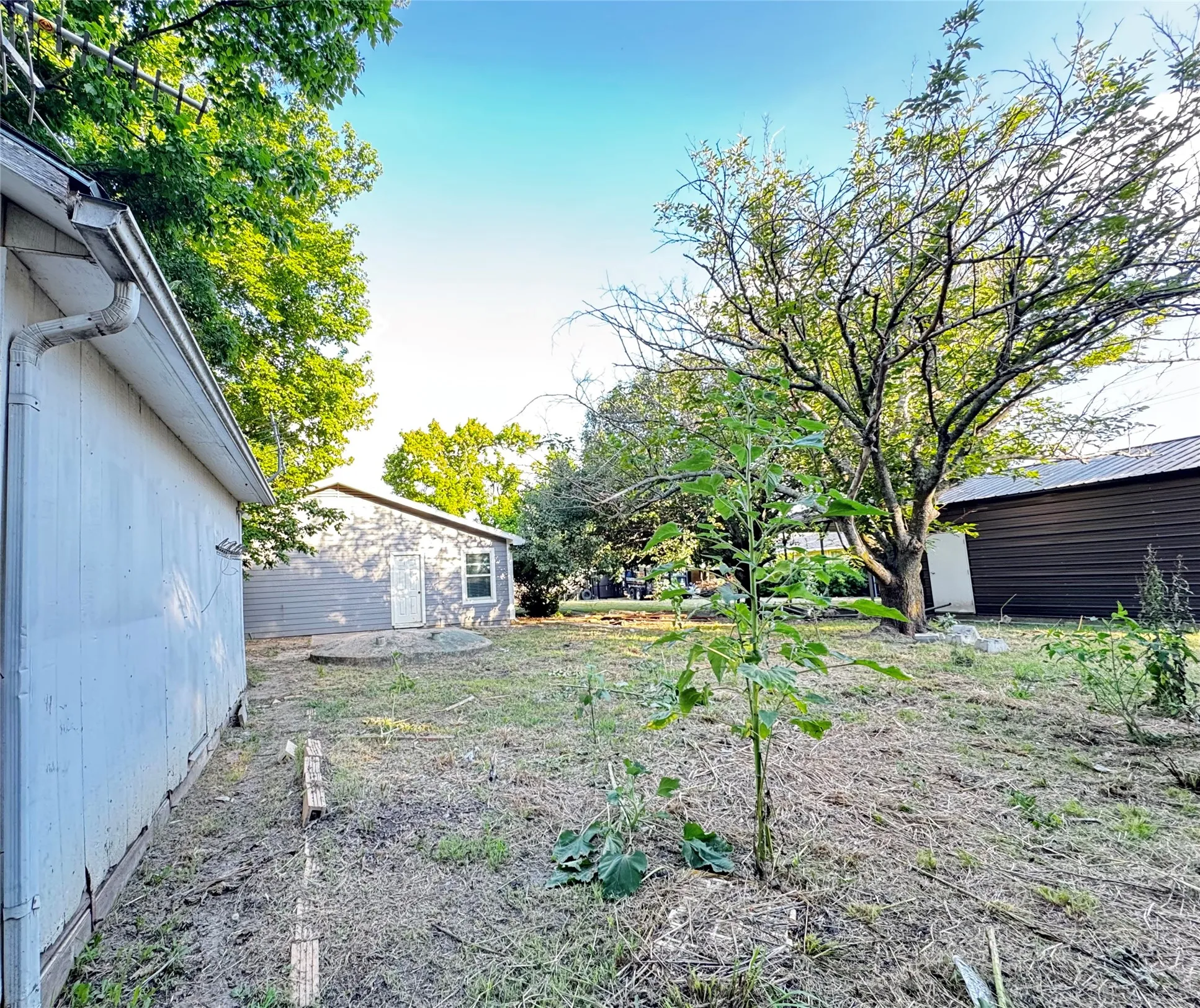 A 0.33-acre lot with no HOA, featuring a wide front sliding entry gate for property access.