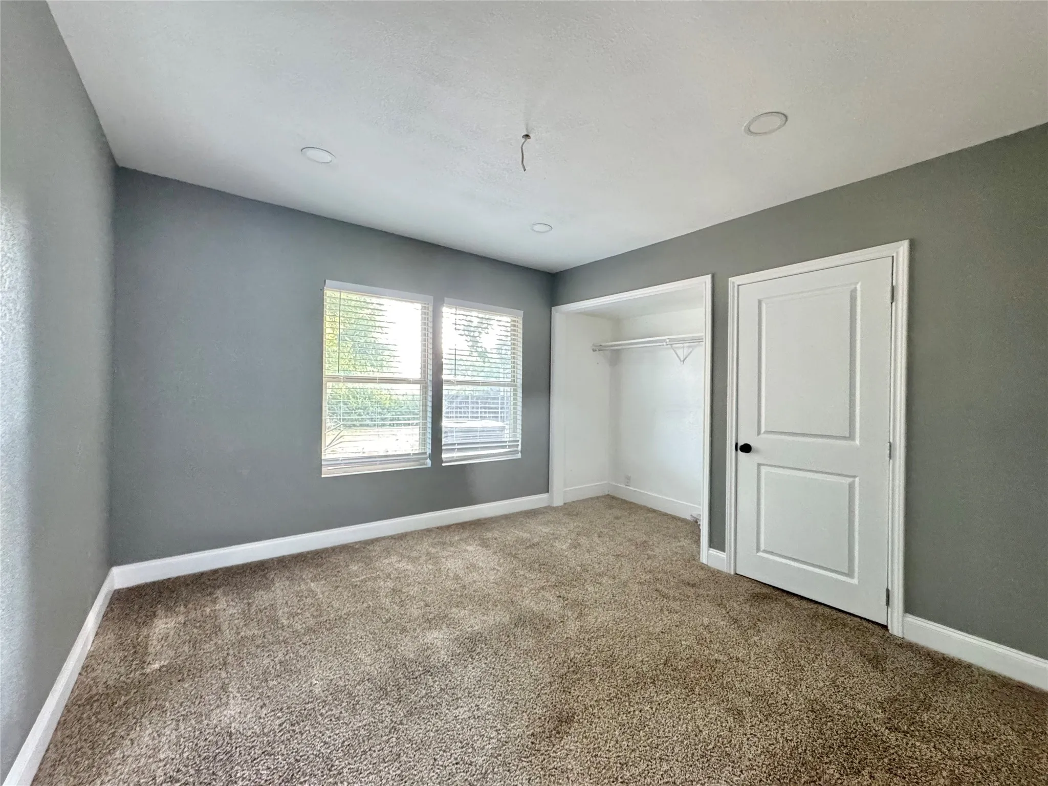  Remaining 3-bedroom, 2-bath layout featuring luxury vinyl plank floors and new interior paint.