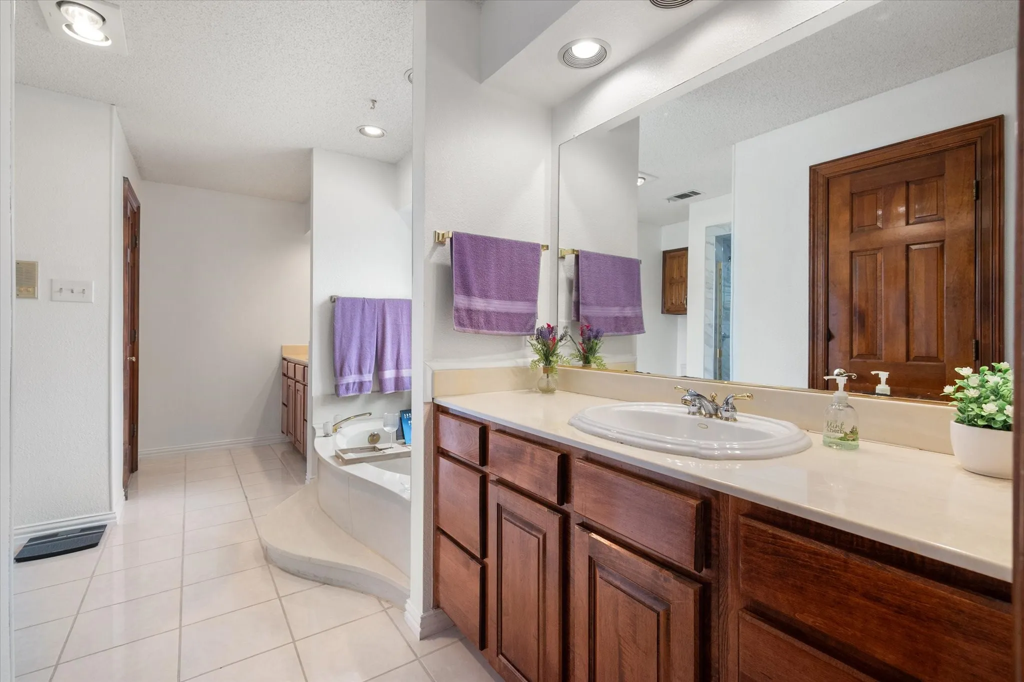 Separate vanities and separate closets