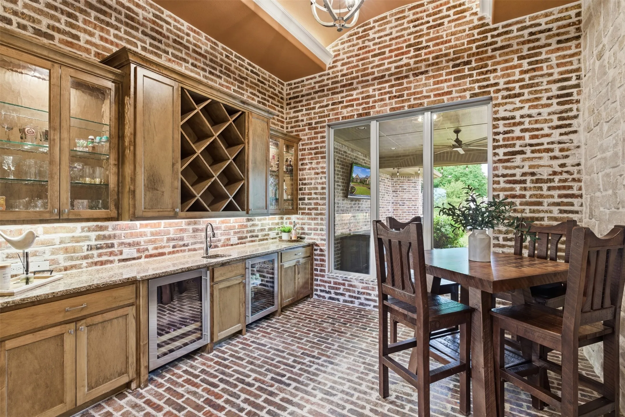 Exposed brick walls and flooring create a distinctive aesthetic