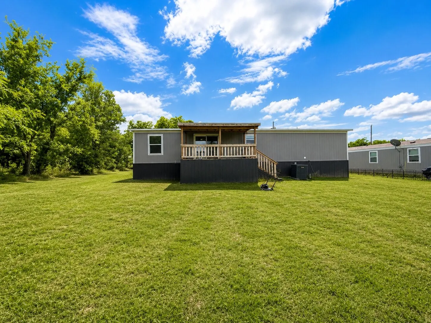 Expansive green lawn providing ample outdoor space