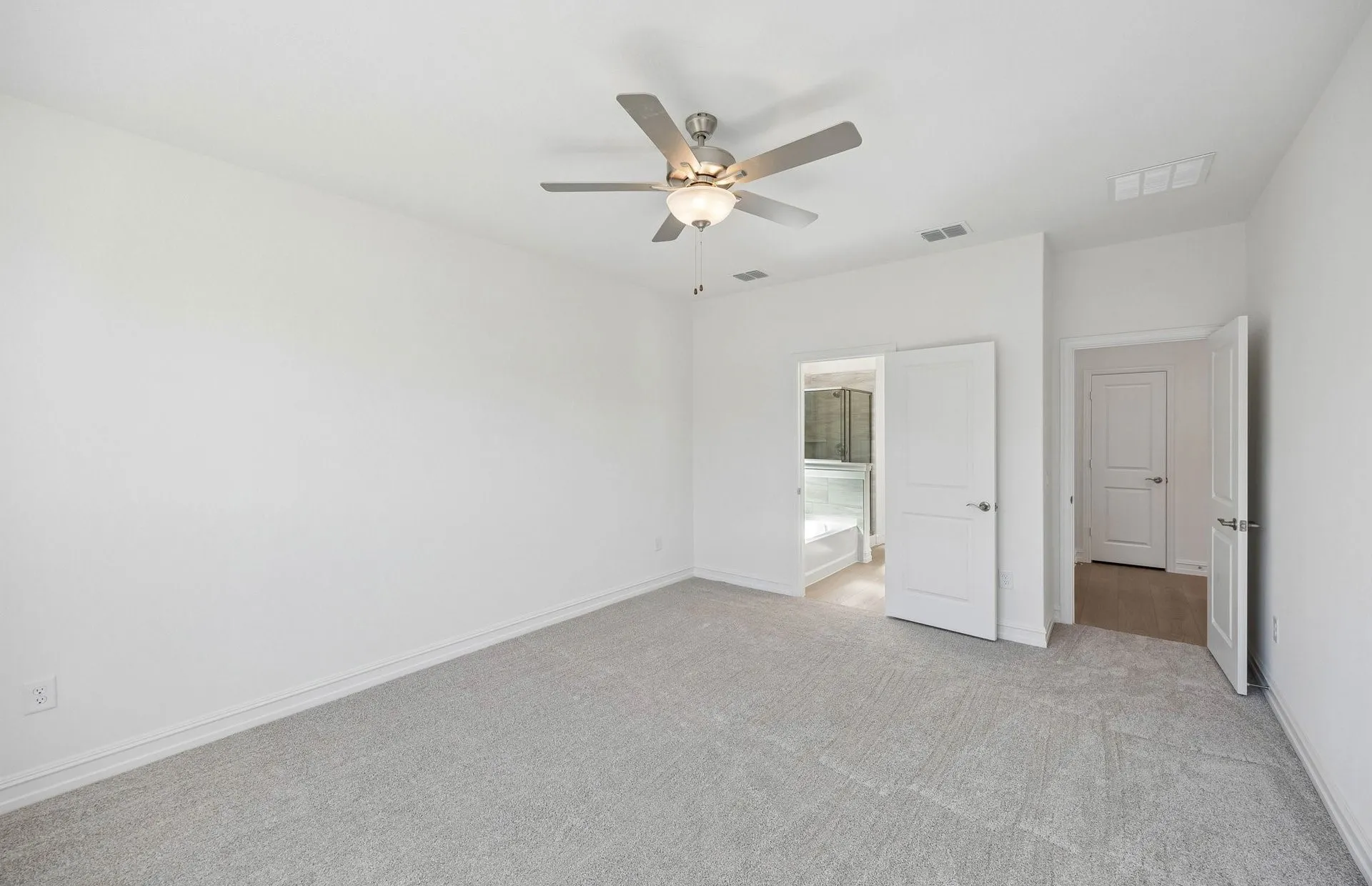 Spacious primary bedroom