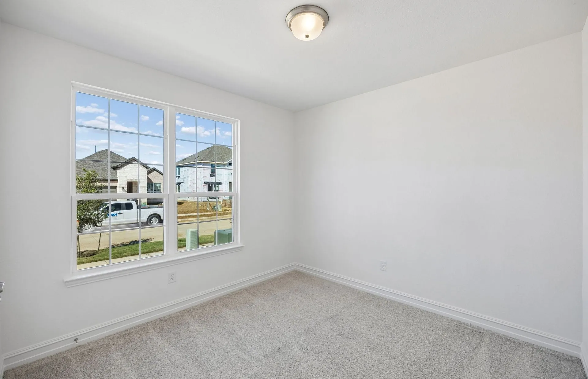 Secondary bedroom with large window