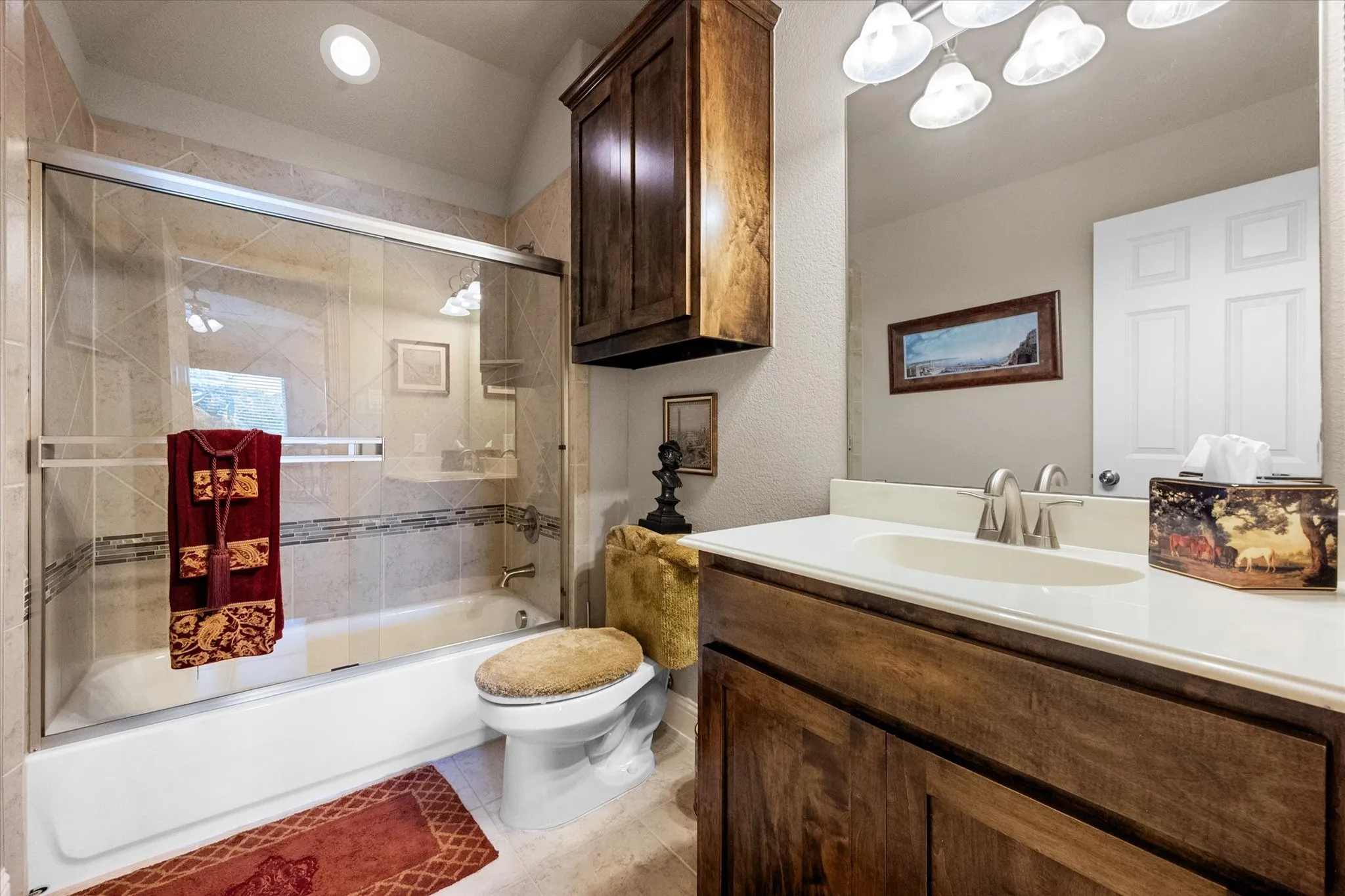 One of the 2 upstairs full bathrooms