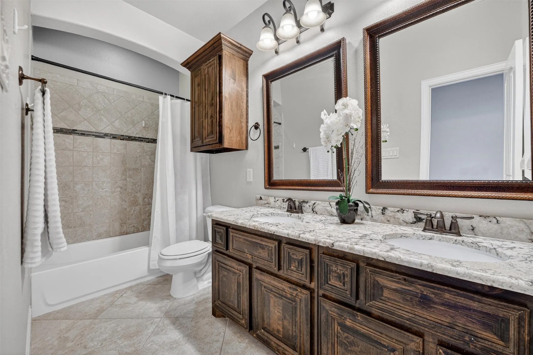 One of two full bathrooms upstairs