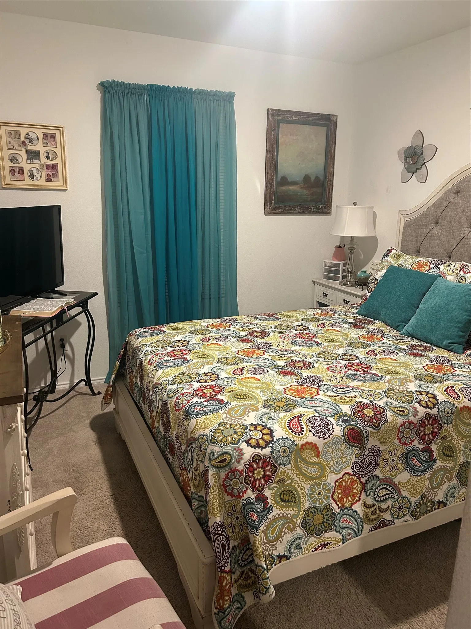 Bedroom featuring neutral wall paint and carpeted flooring