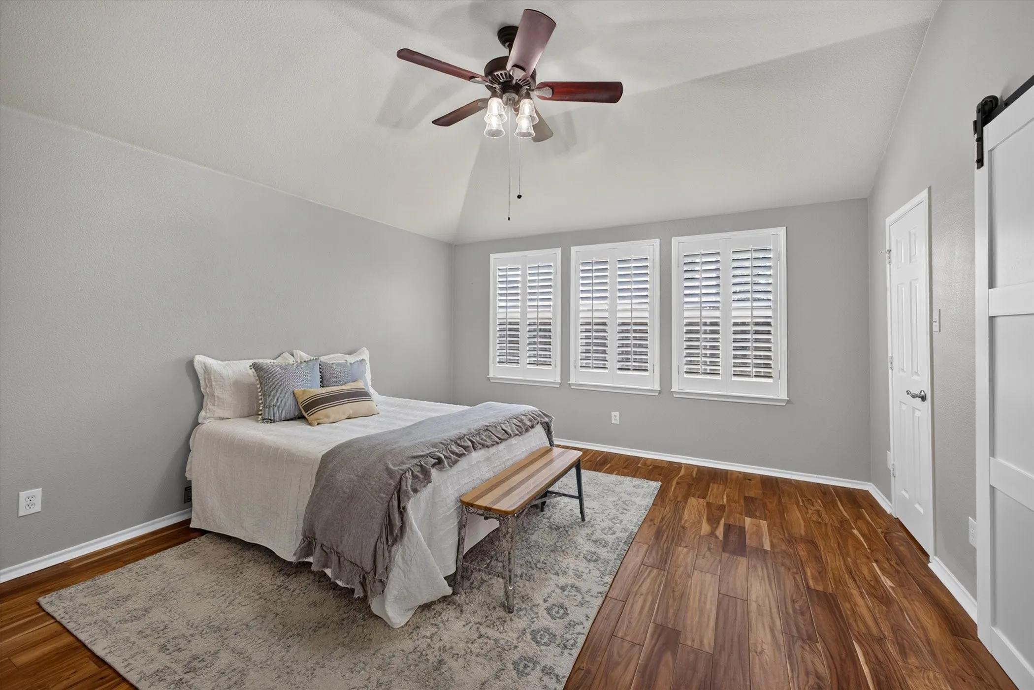 Spacious primary bedroom with walk in closet and en-suite bath