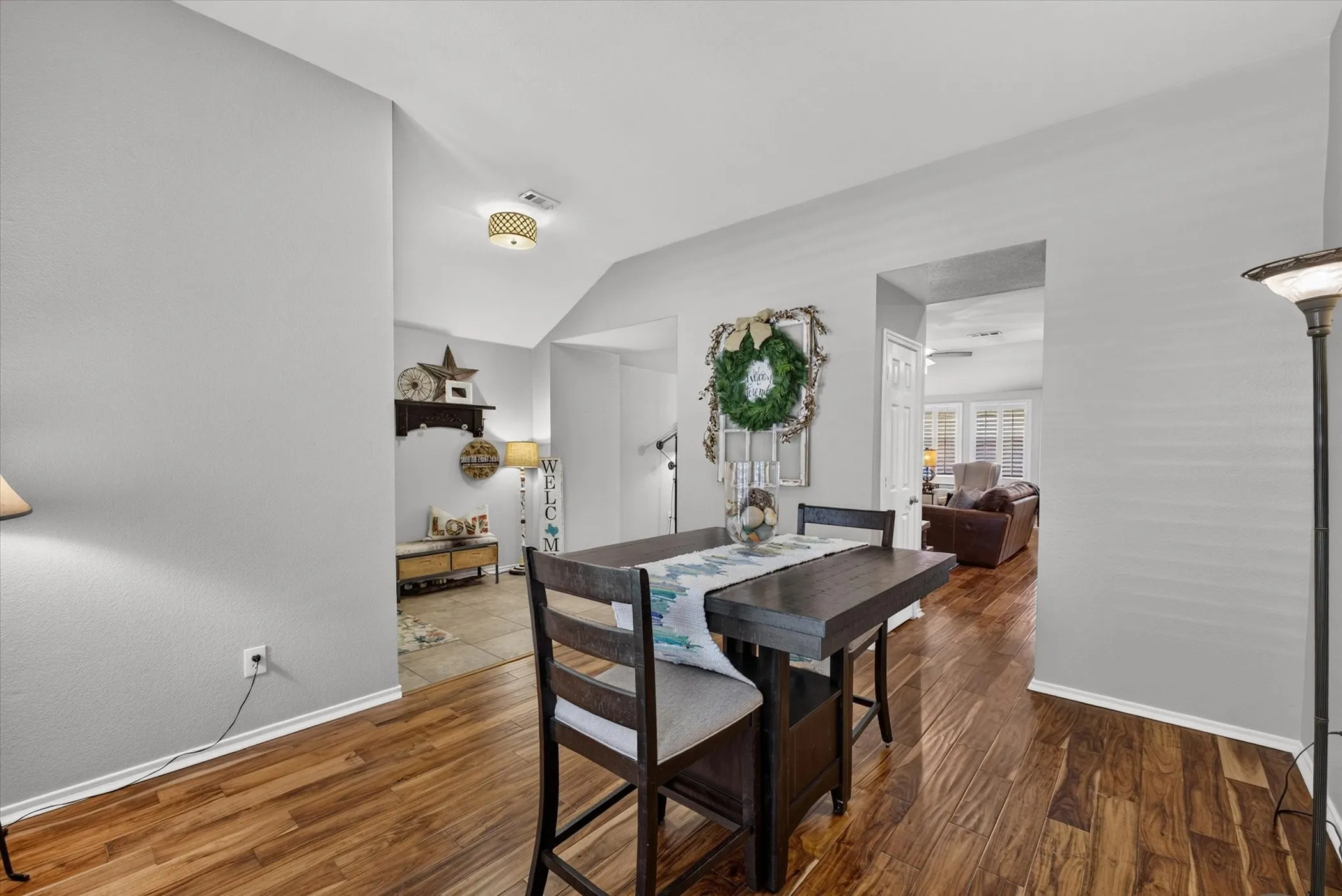 Spacious dining off the entry with engineered hardwood floors