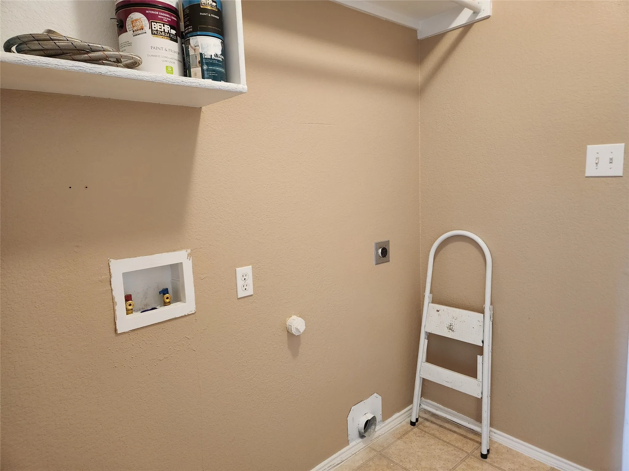 Full size laundry with hookups for washer and dryer