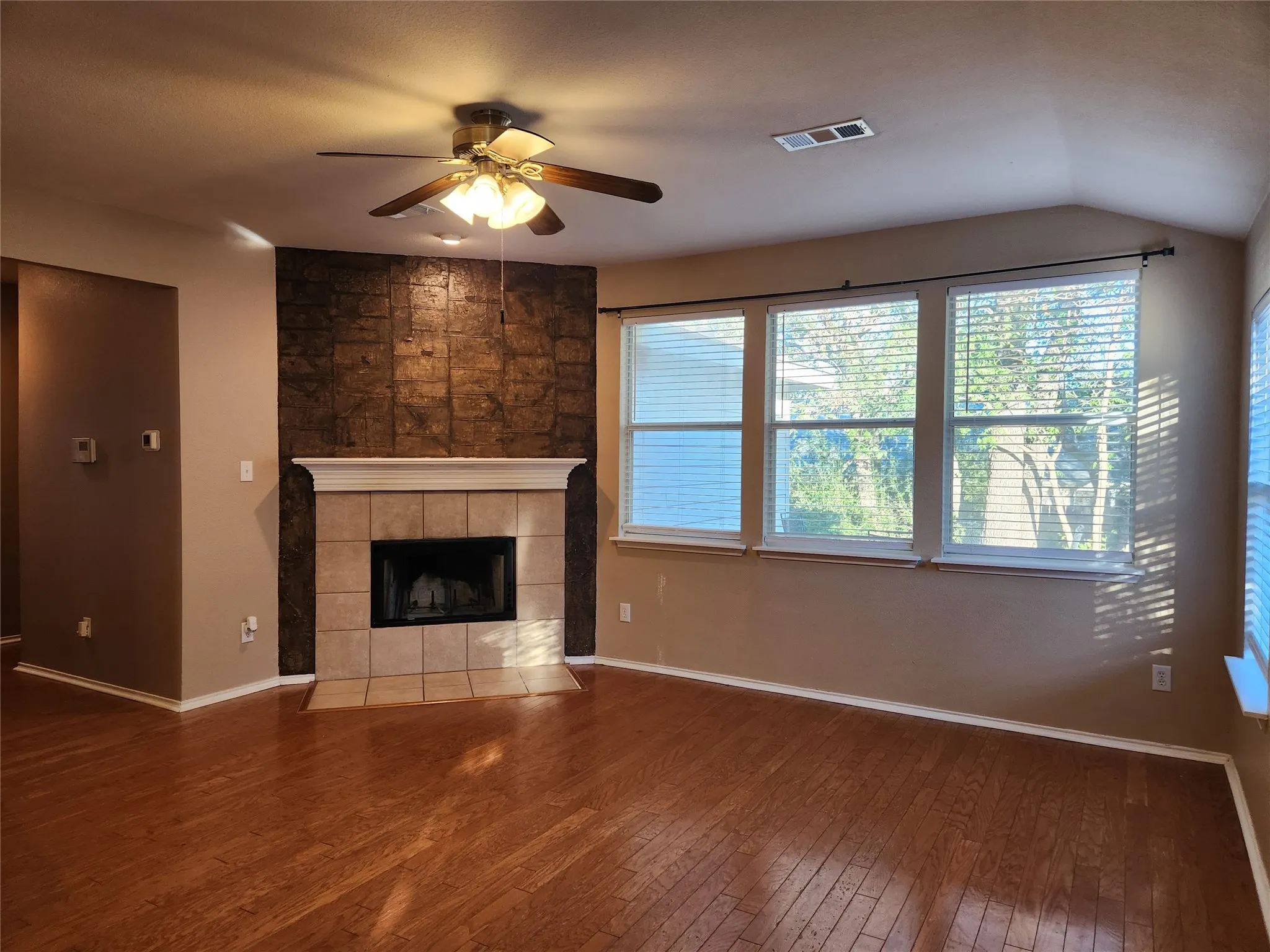 Primary living area has wood burning fireplace