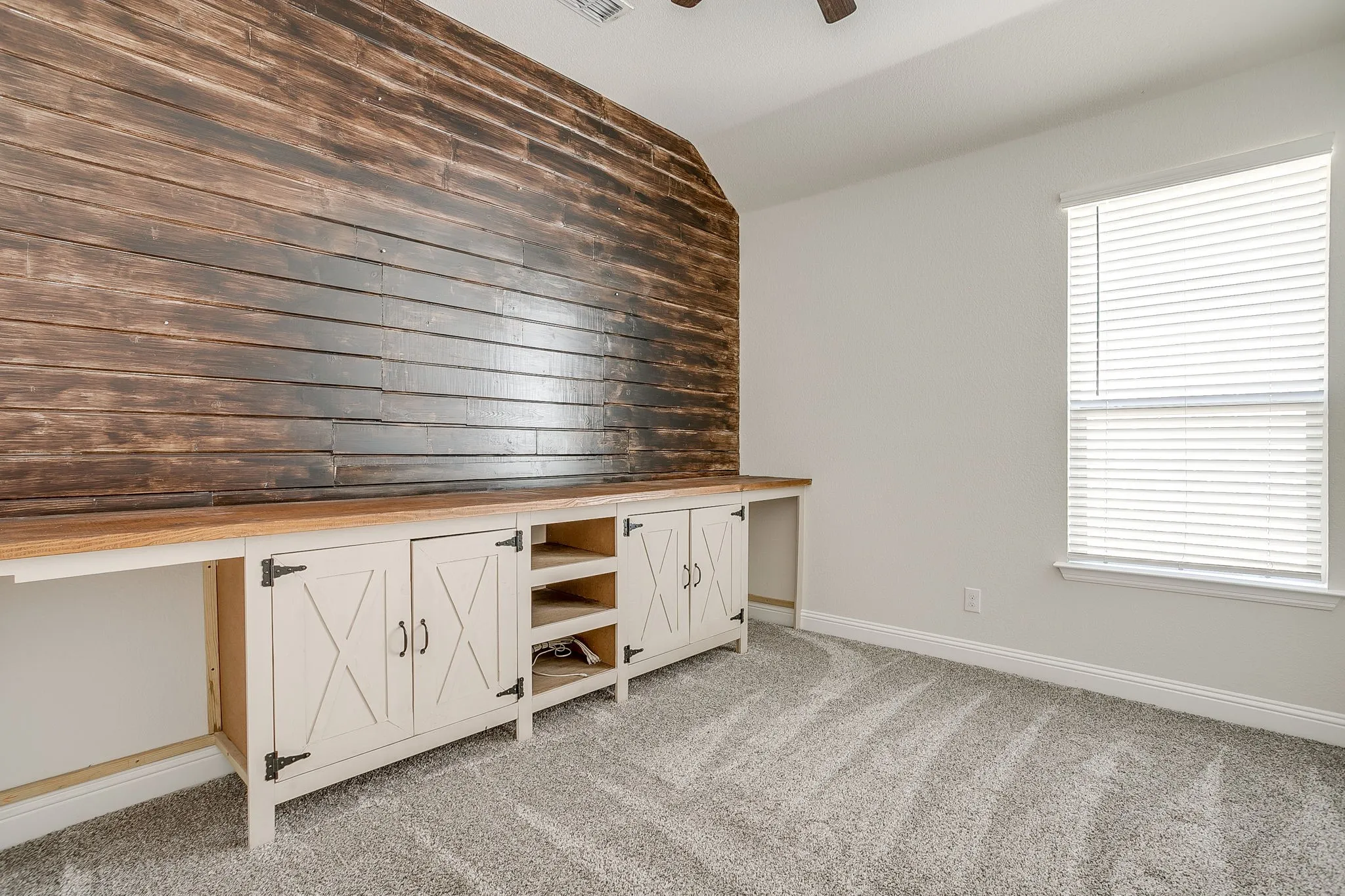 4th Bedroom is also bonus room with built ins.