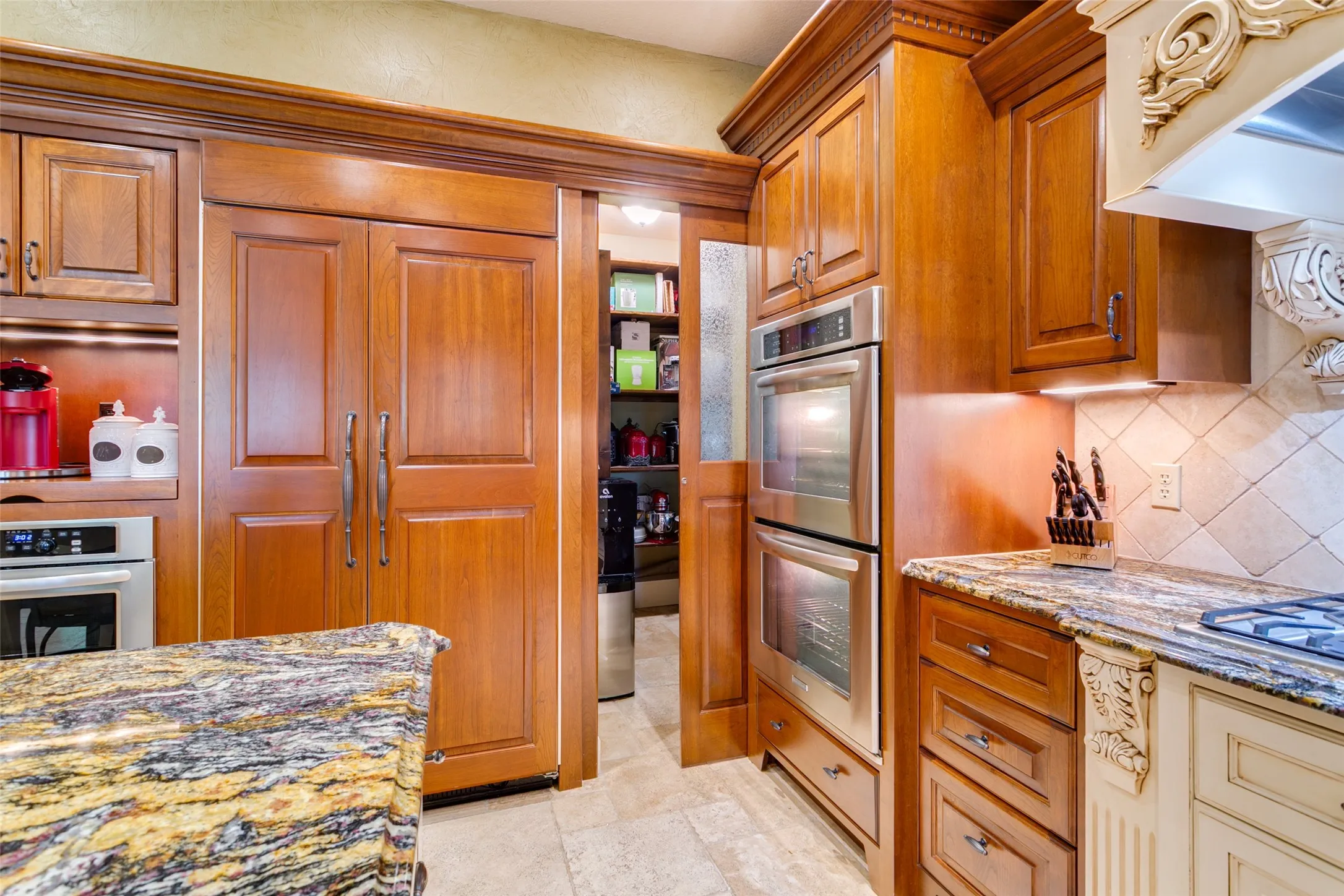 Don't miss the hidden walk-in pantry