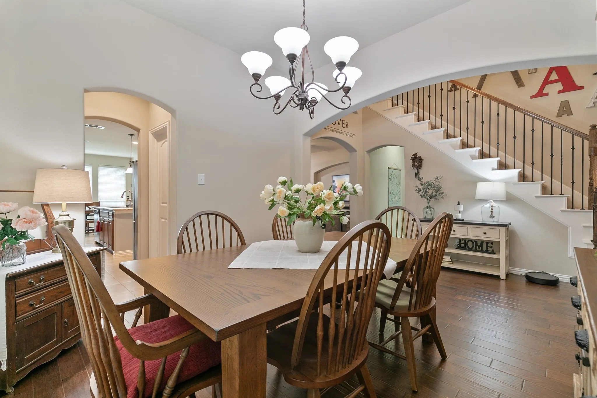 Spacious dining room that opens to both the kitchen and the entryway
