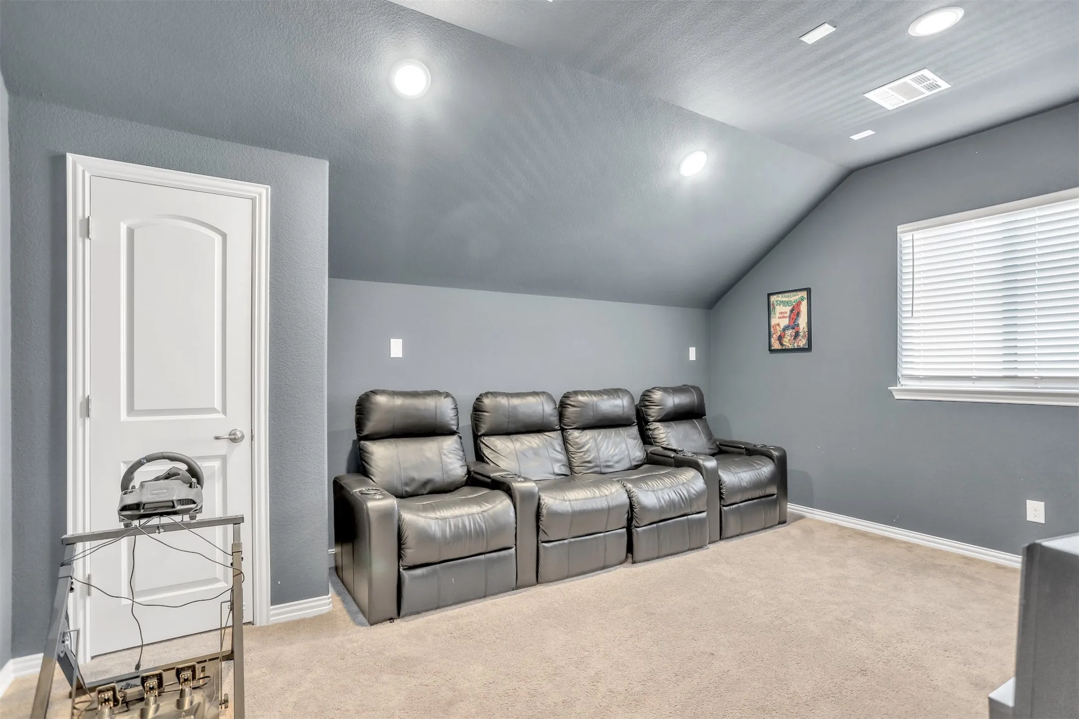 Currently being uses as a media room. Could also be a bedroom or workout space.
