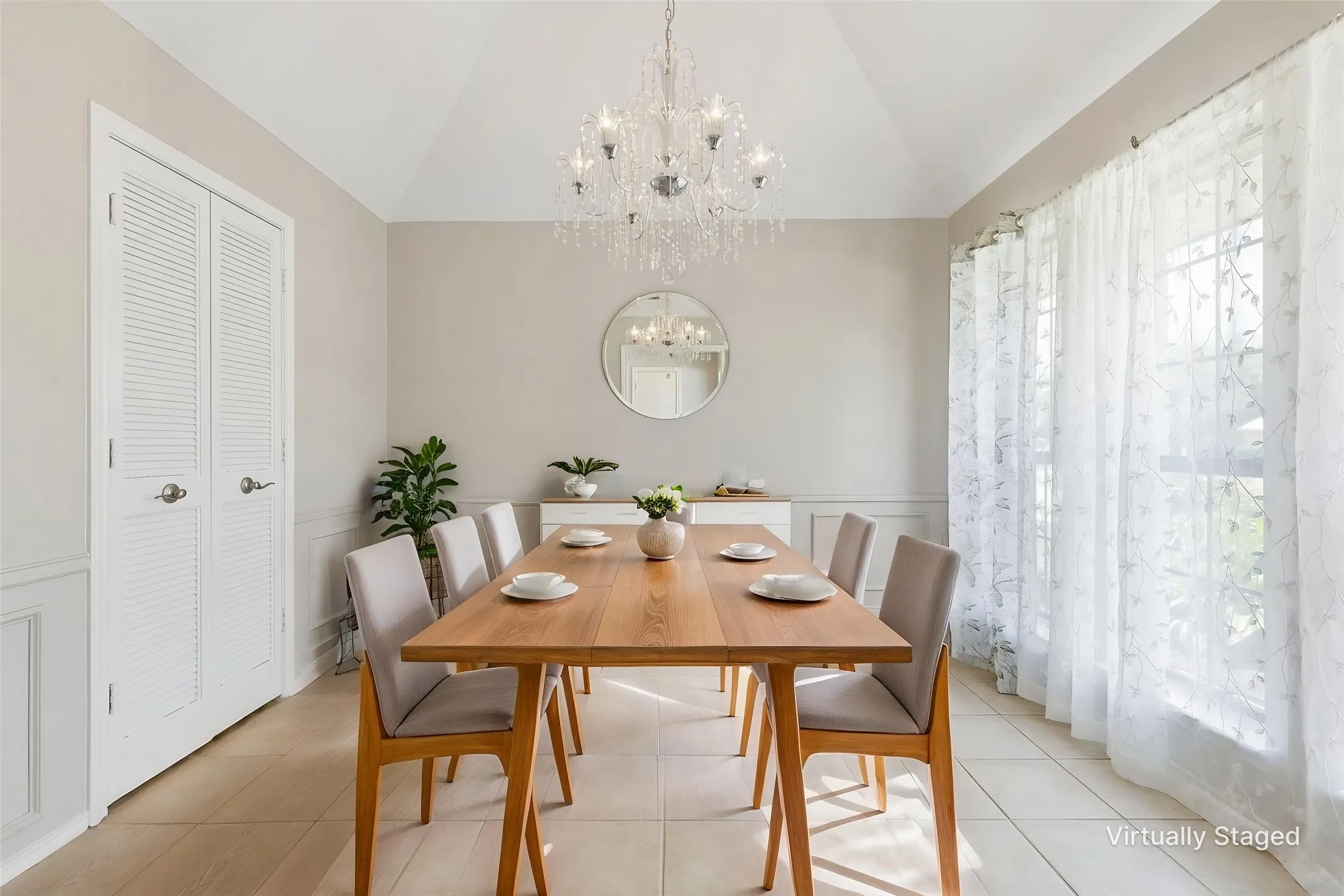 Formal dining with chandelier.  Opens to the entry and to the kitchen.