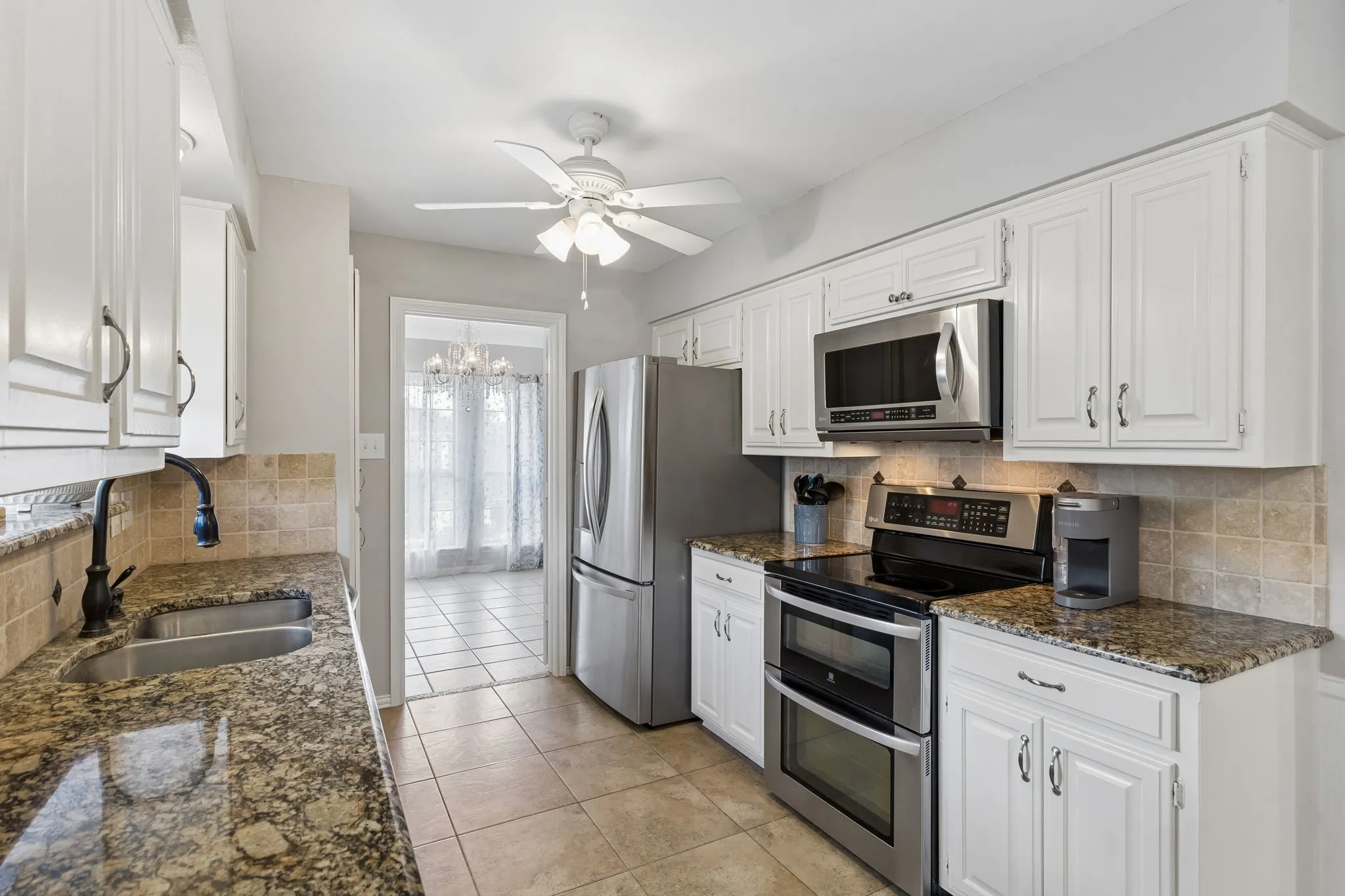 Granite counters, stone back splash, all LG stainless appliances.