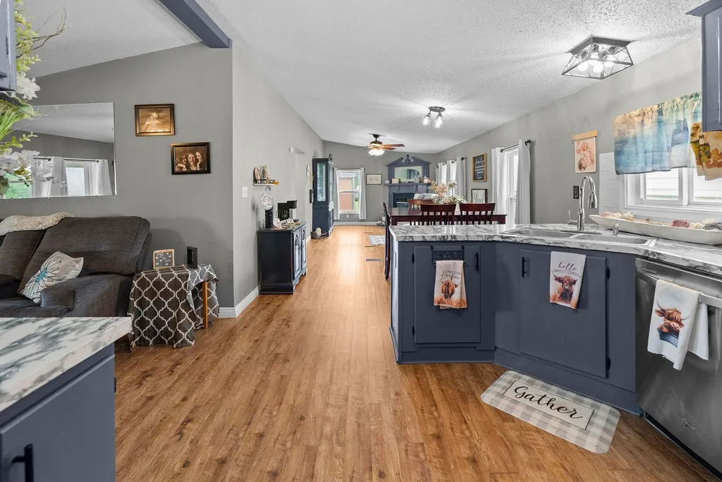 Kitchen is open to living room and dining room/hearth room