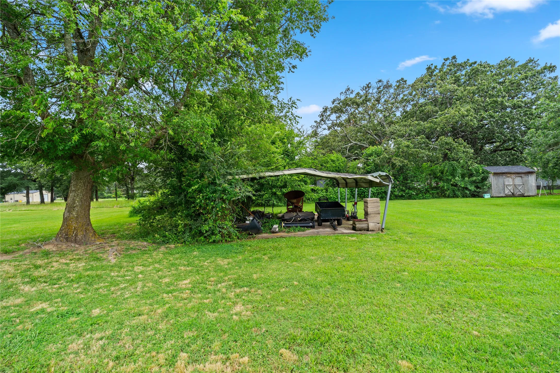 Large backyard with extra carpot for covered storage