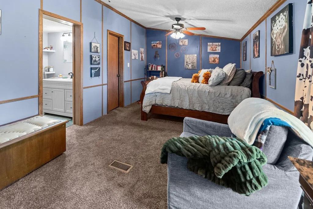 Primary bedroom is massive, with plenty of room for a seating area, ensuite bath, plus a 10x8 WIC and a second closet.