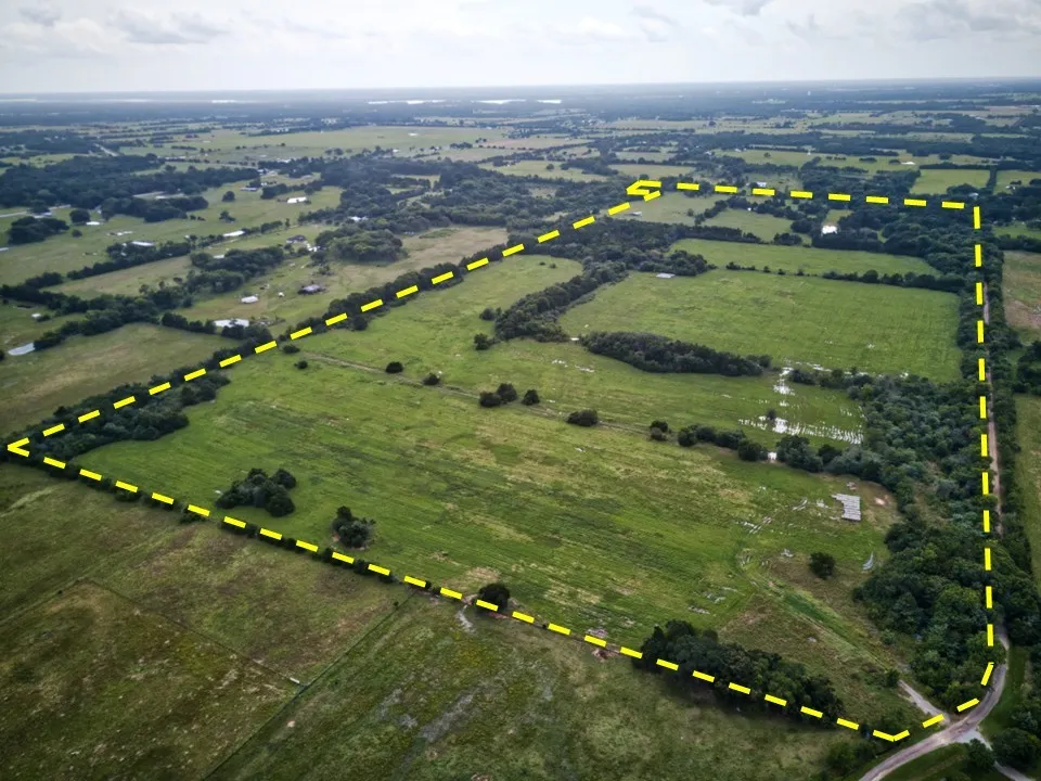 157 acres, well, and hay barn.