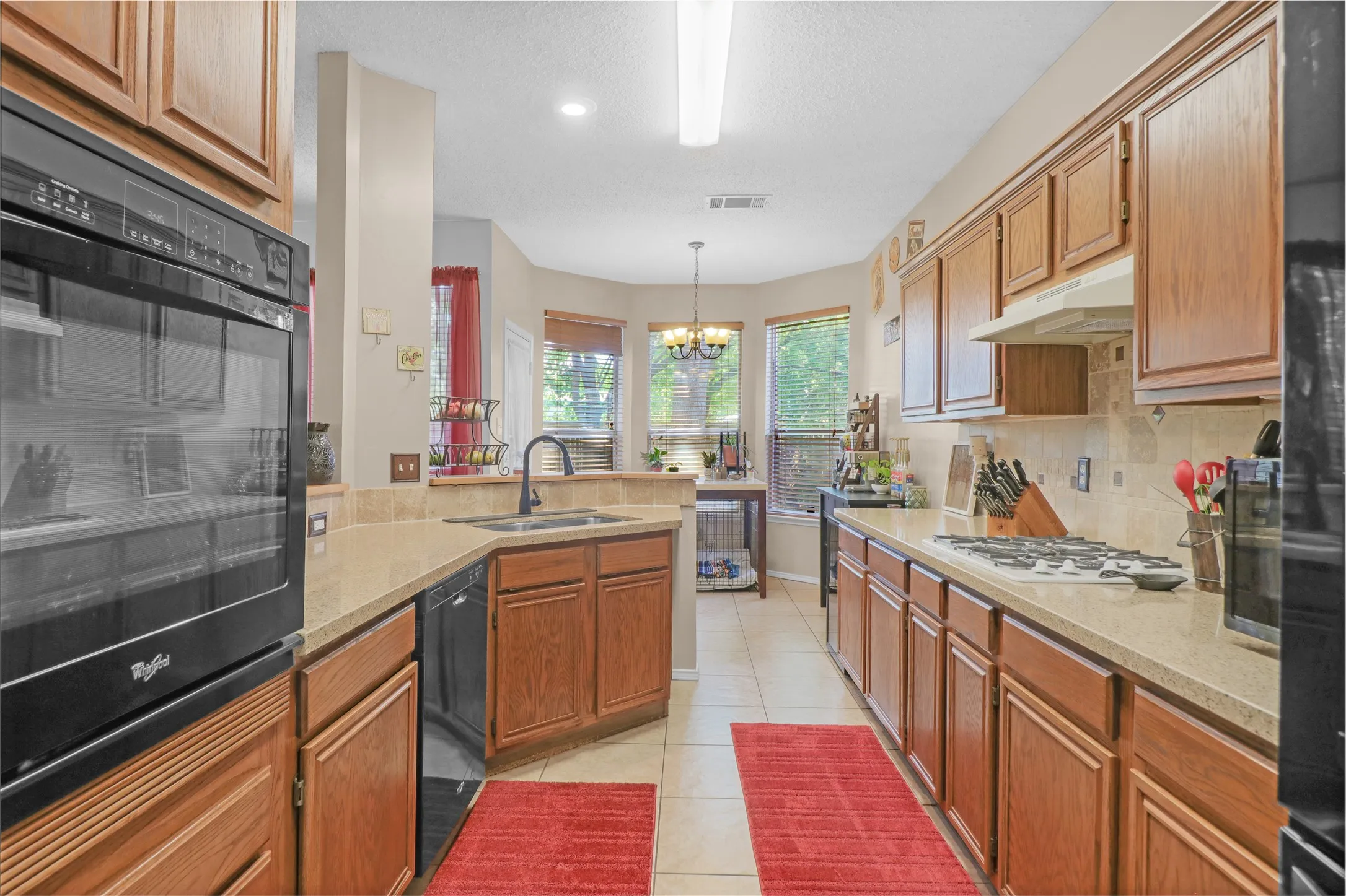 Breakfast dining area off kitchen leads to back yard.