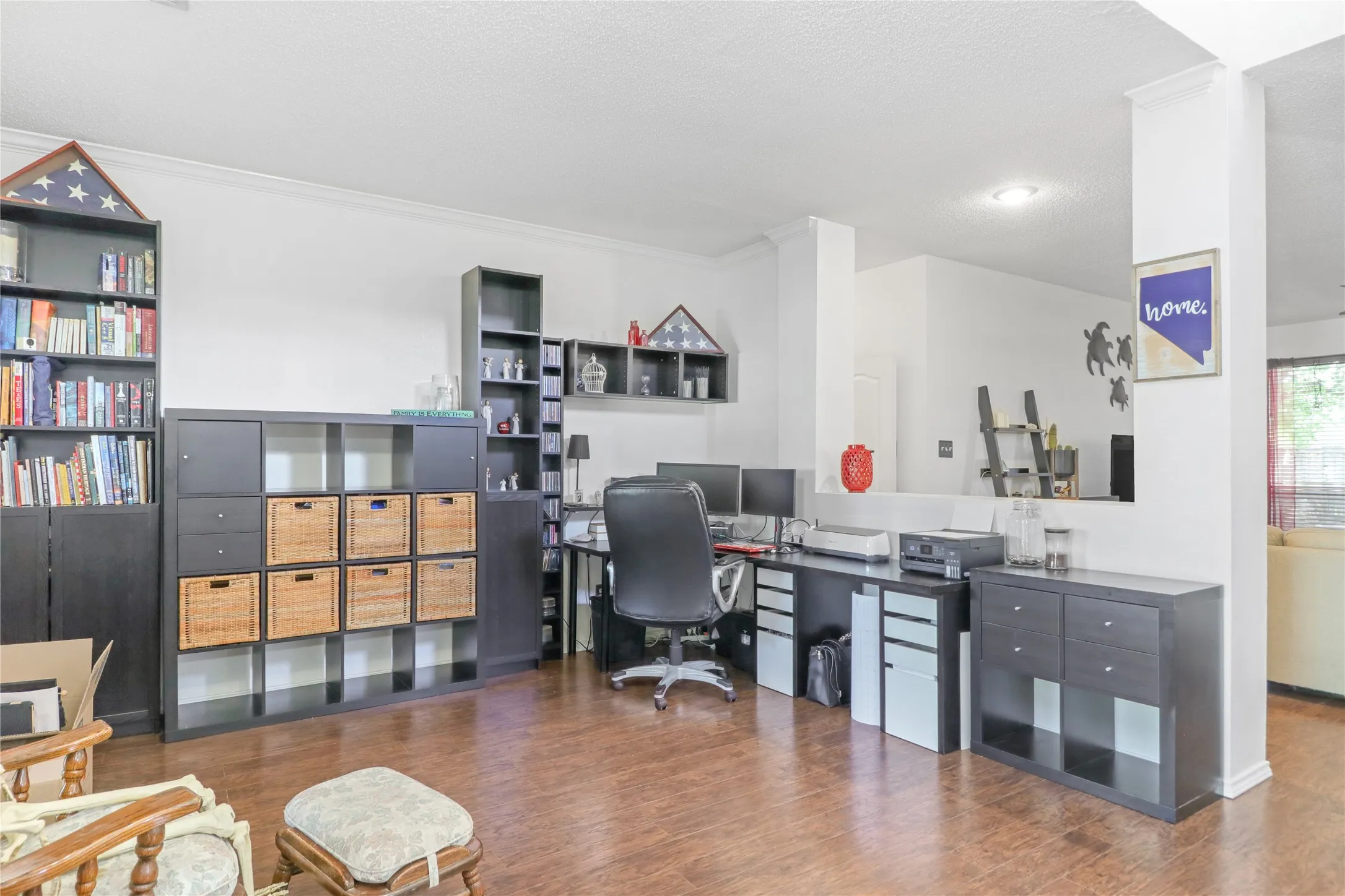 Formal living room being used as a home office.