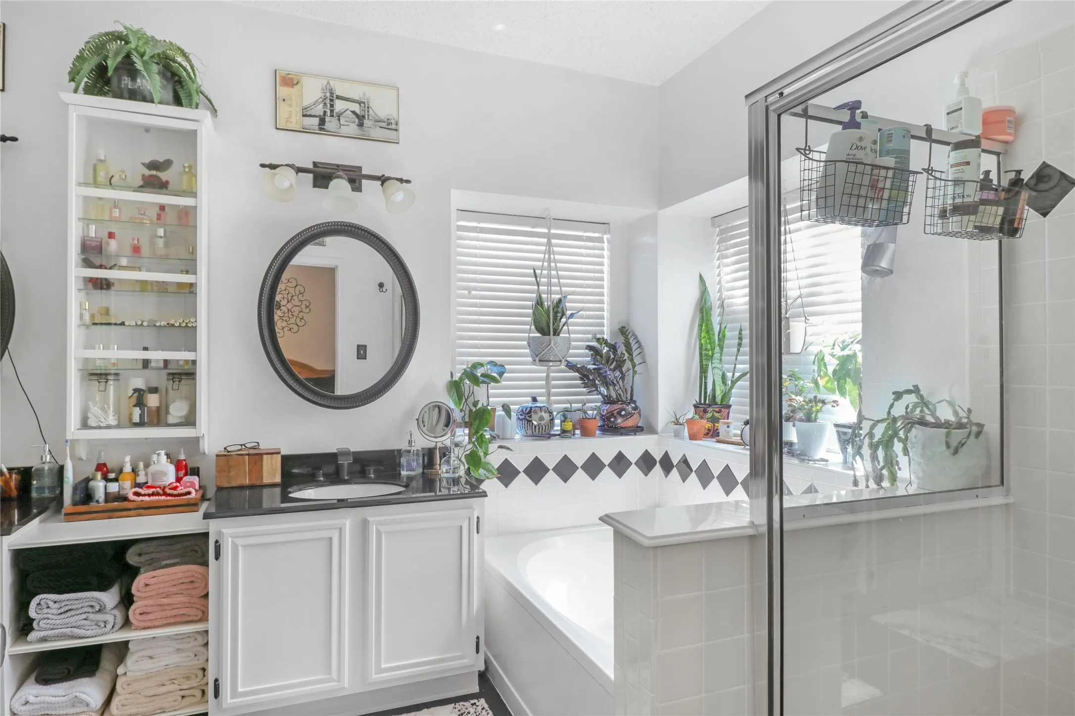 Master bath with separate shower and garden tub.