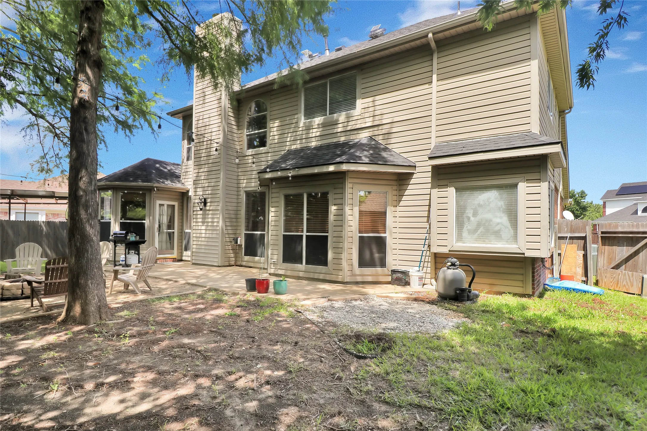 Outside with patio space and plenty of entertaining room.