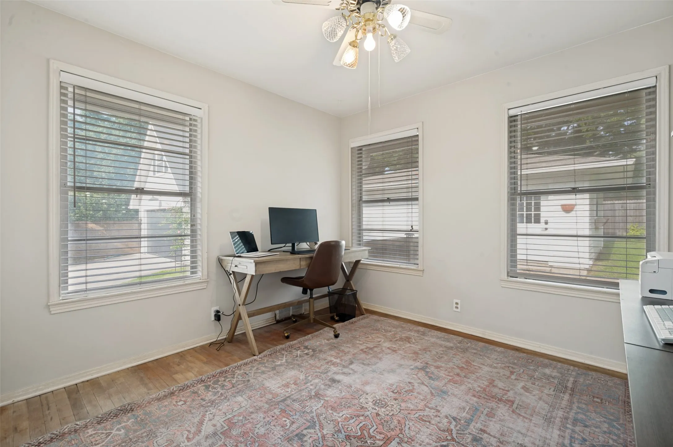 The front corner bedroom has great views of the neighborhood.