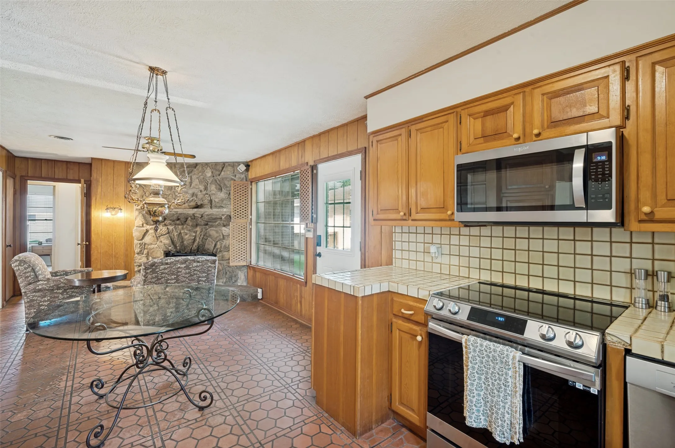 The eating area is conveniently located next to the kitchen making it quick and easy to serve meals.