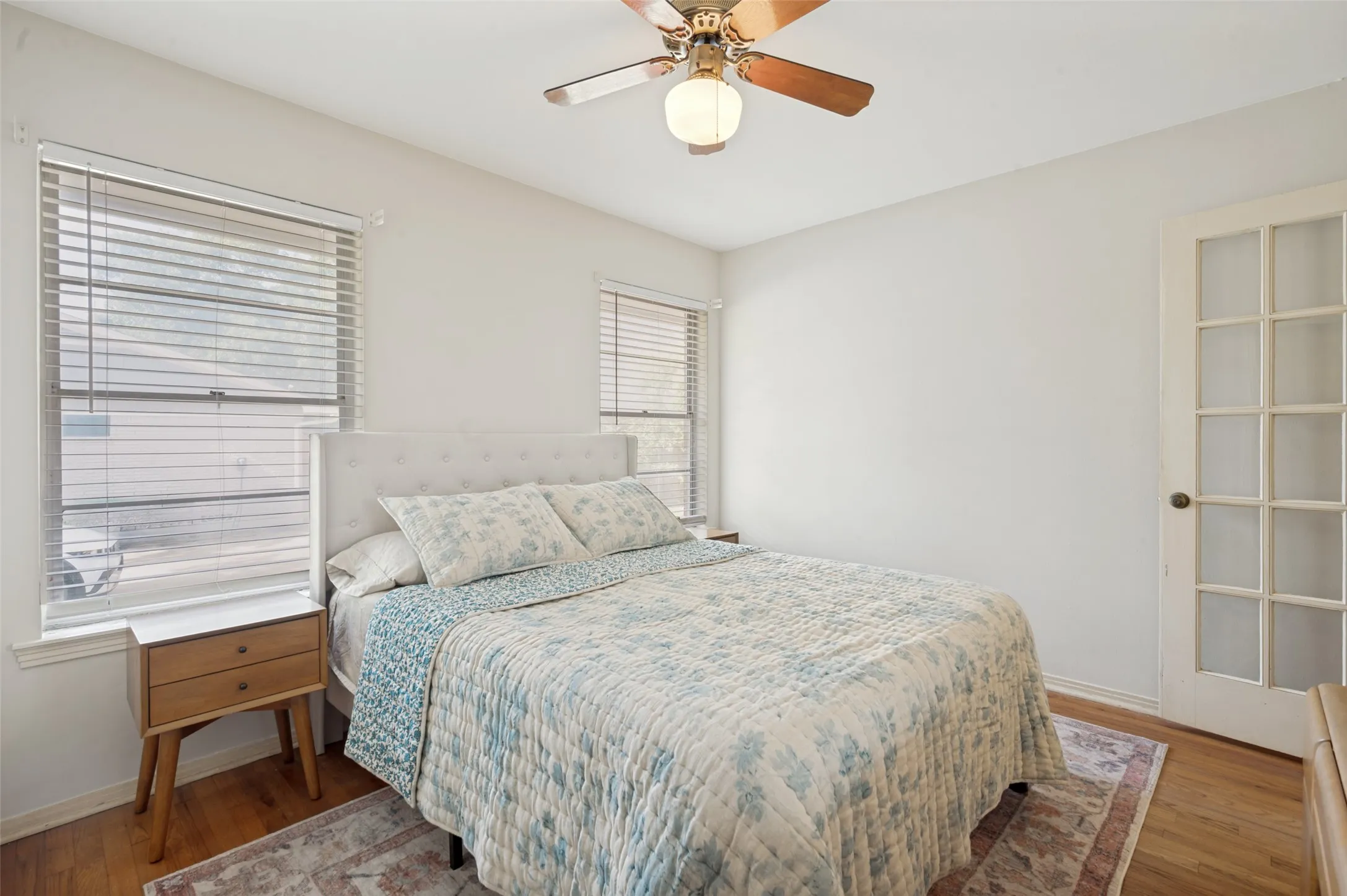 Notice the vintage single French door that adds timeless charm