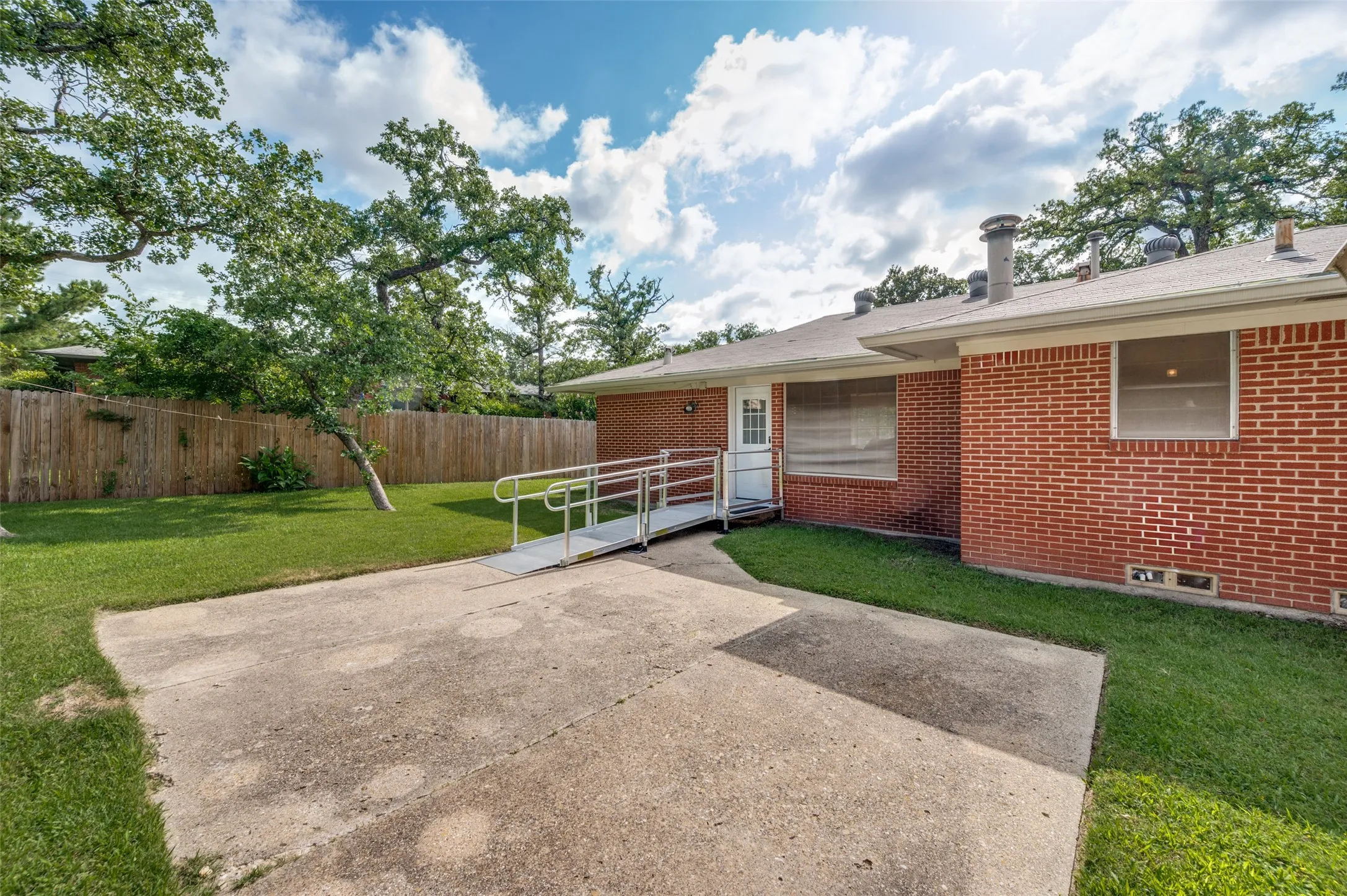 A convenient accessibility ramp is located at the backdoor.