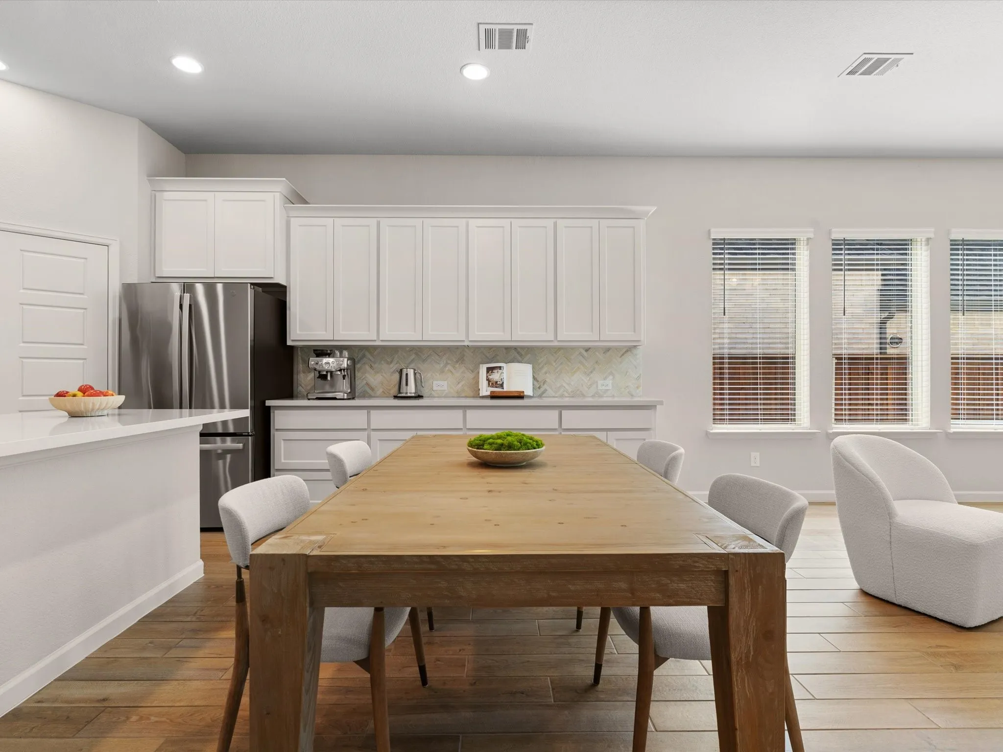 Dining area conveniently located adjacent to the kitchen and living room.
