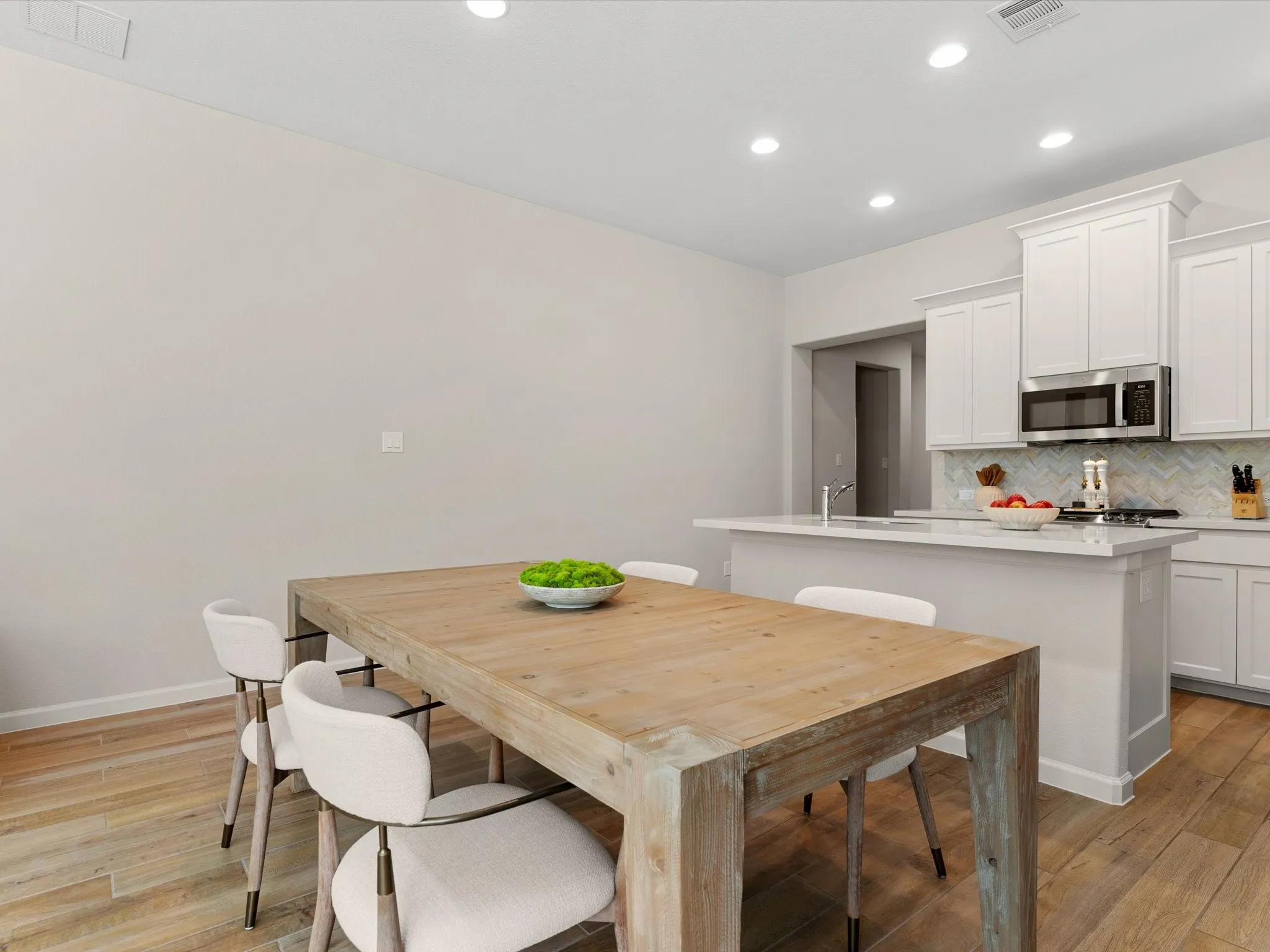 Dining area conveniently located adjacent to the kitchen and living room.