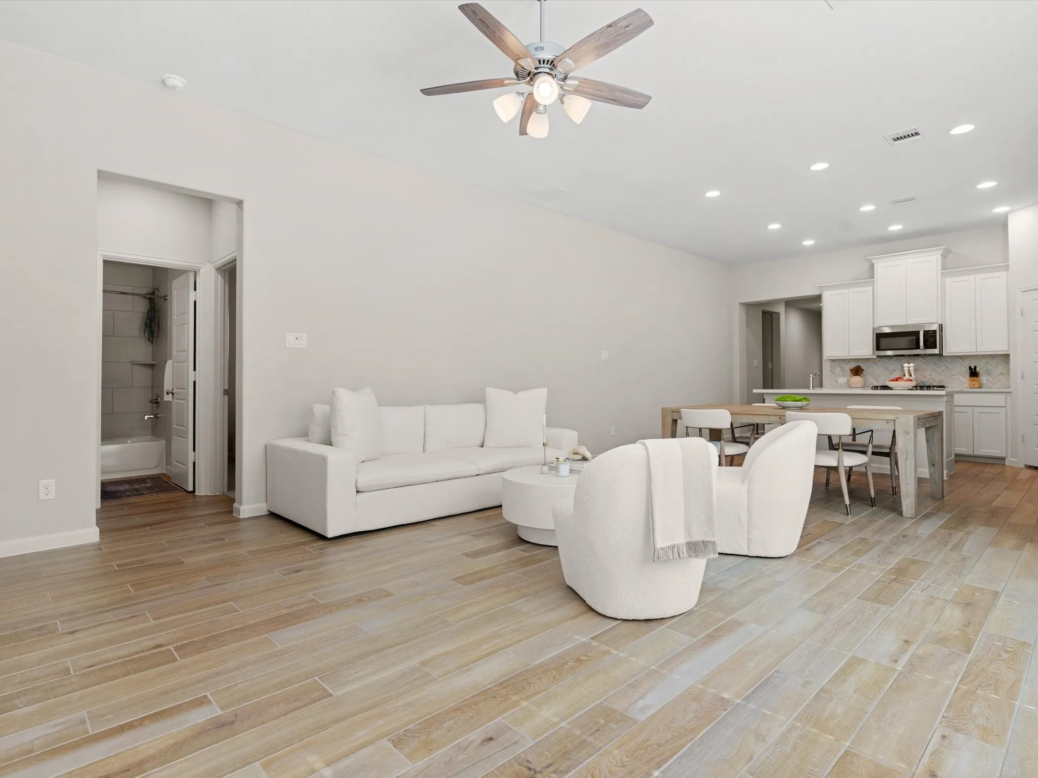 Spacious living room with abundant natural light and open-concept layout.