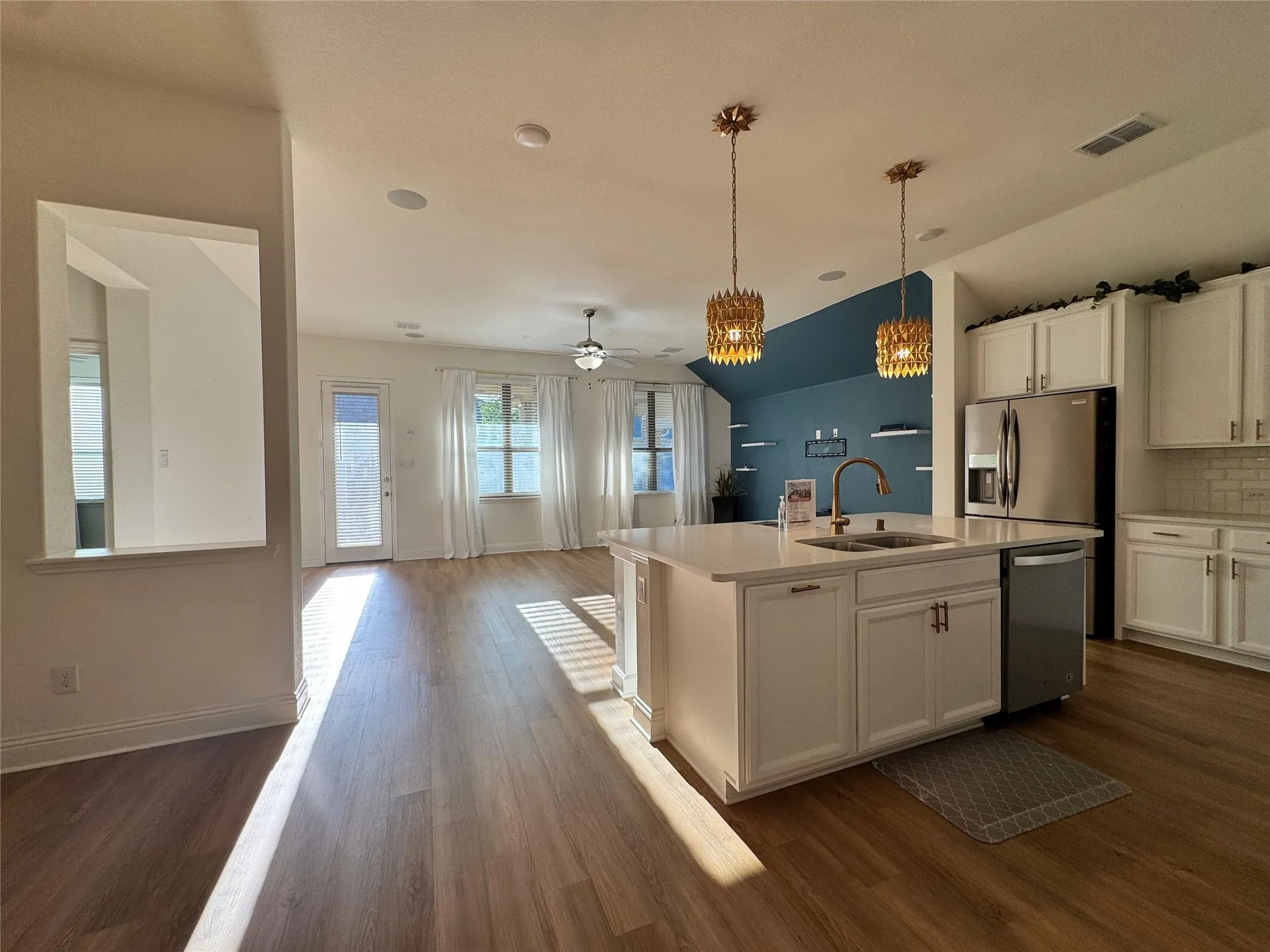 Open flare floor plan leads to large backyard
